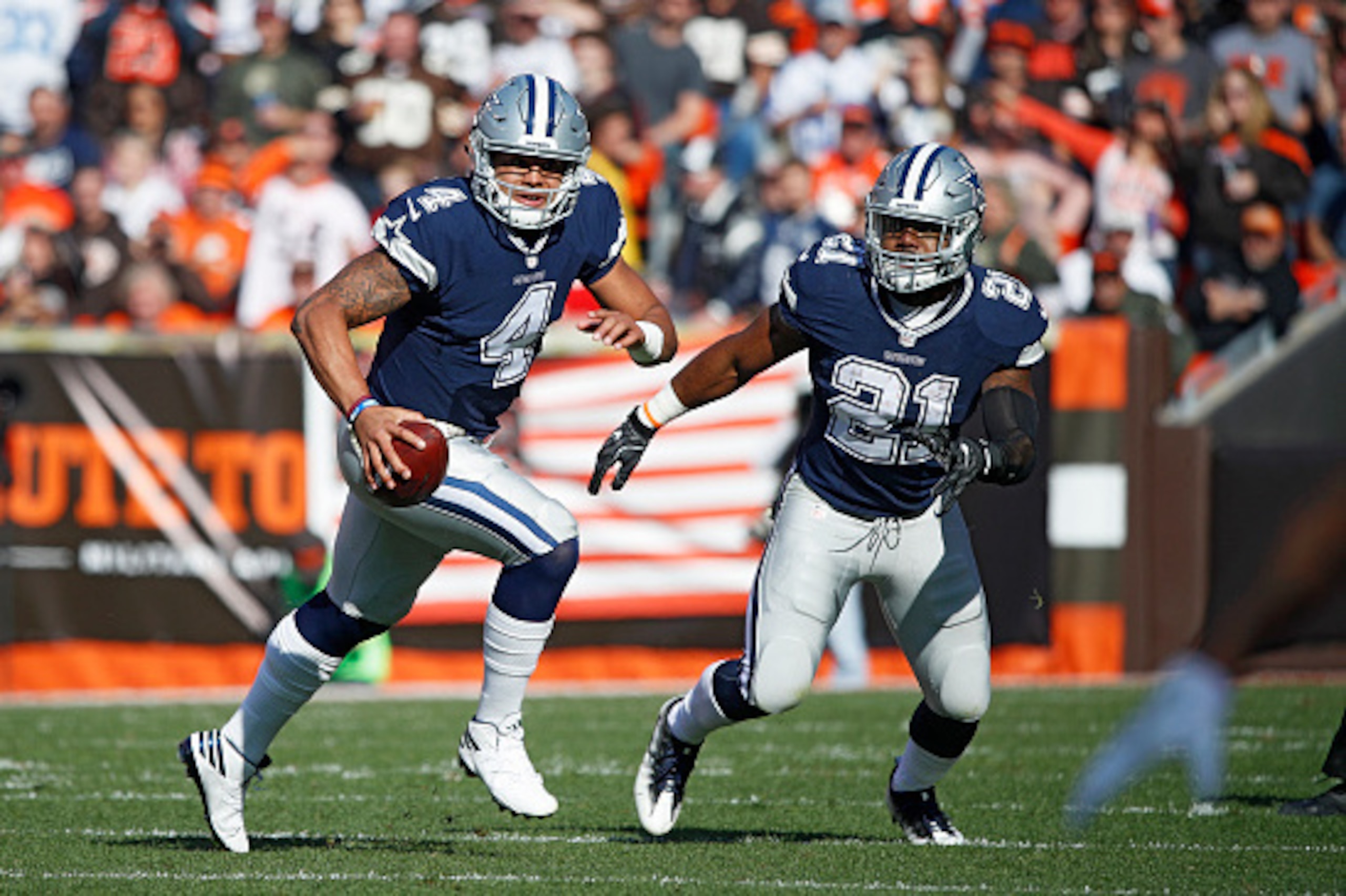 CLEVELAND, OH - NOVEMBER 06: Dak Prescott #4 and Ezekiel Elliott #21 of the Dallas Cowboys in action against the Cleveland Browns during the game at FirstEnergy Stadium on November 6, 2016 in Cleveland, Ohio. Dallas defeated Cleveland 35-10. (Photo by Joe