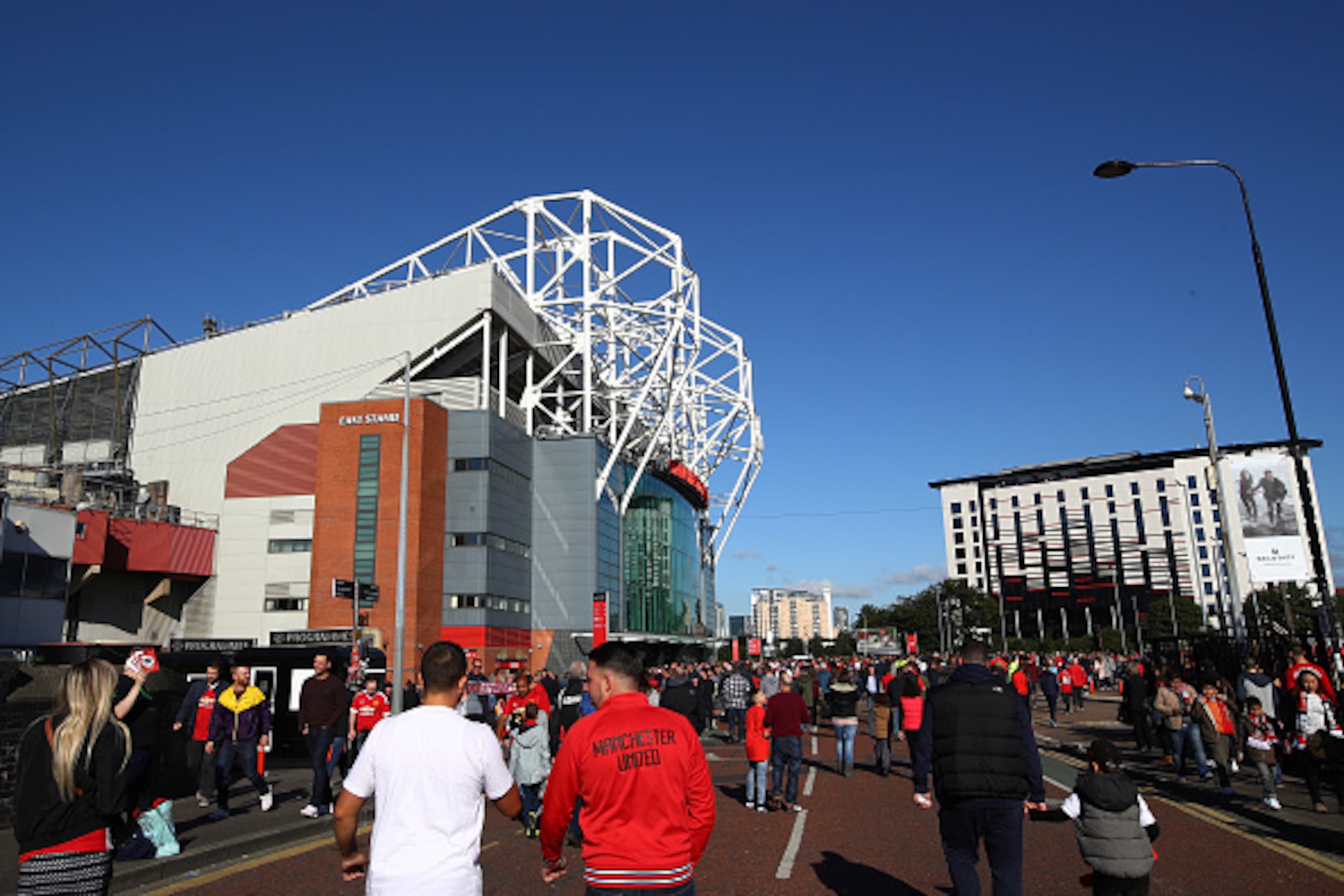 MANCHESTER, ENGLAND - OCTOBER 02:  General view outside the stadium as the fans make their way to the stadium during the Premier League match between Manchester United and Stoke City at Old Trafford on October 2, 2016 in Manchester, England.  (Photo by Cl