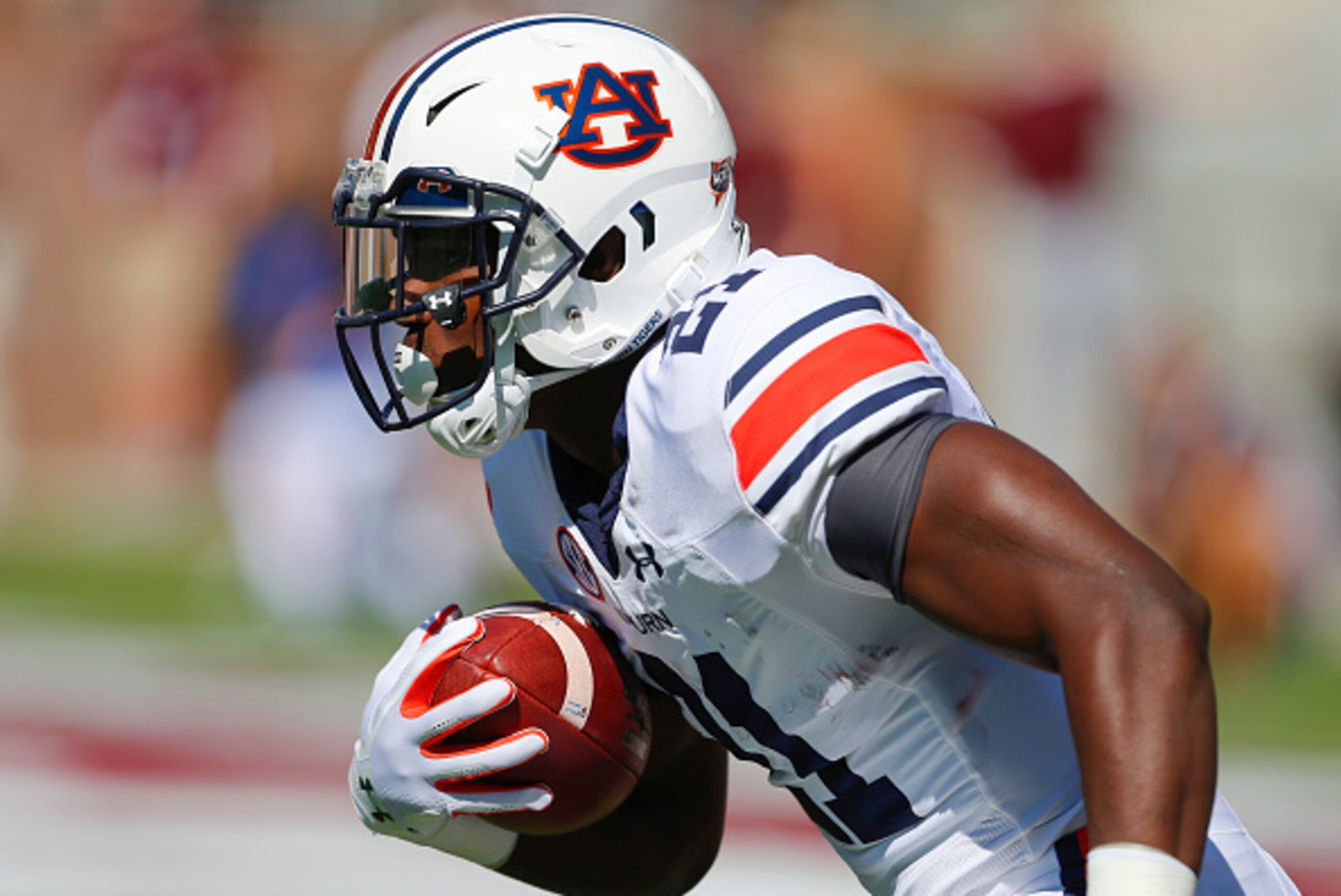 STARKVILLE, MS - OCTOBER 8:  Running back Kerryon Johnson #21 of the Auburn Tigers carries the ball against the Mississippi State Bulldogs during the first half of an NCAA college football game on Oct. 8, 2016 in Starkville, Mississippi. (Photo by Butch D