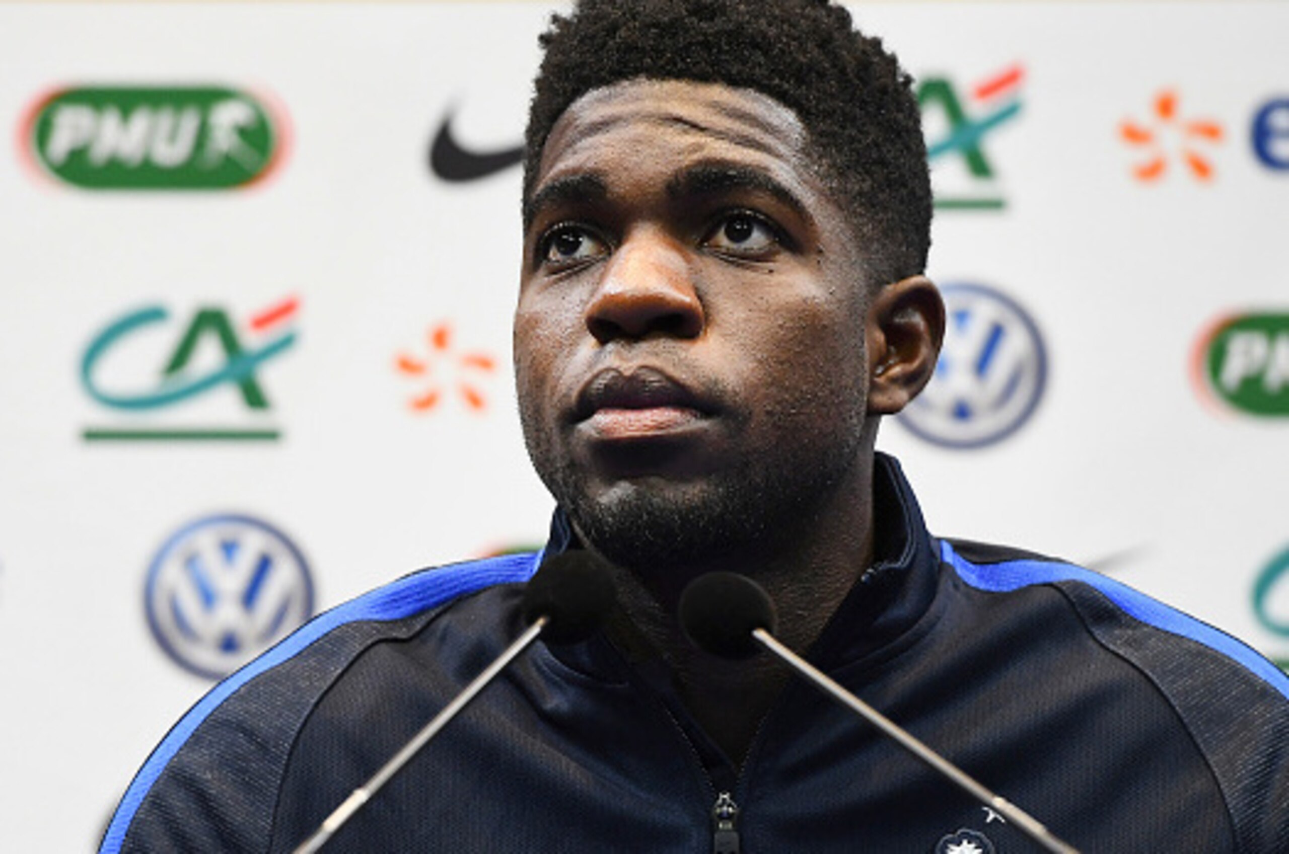 France's defender Samuel Umtiti gives a press conference in Clairefontaine-en-Yvelines, near Paris, on November 8, 2016, on the team's preparation for the upcoming World Cup 2018 football qualifiers.
With seven points from three games France are level top