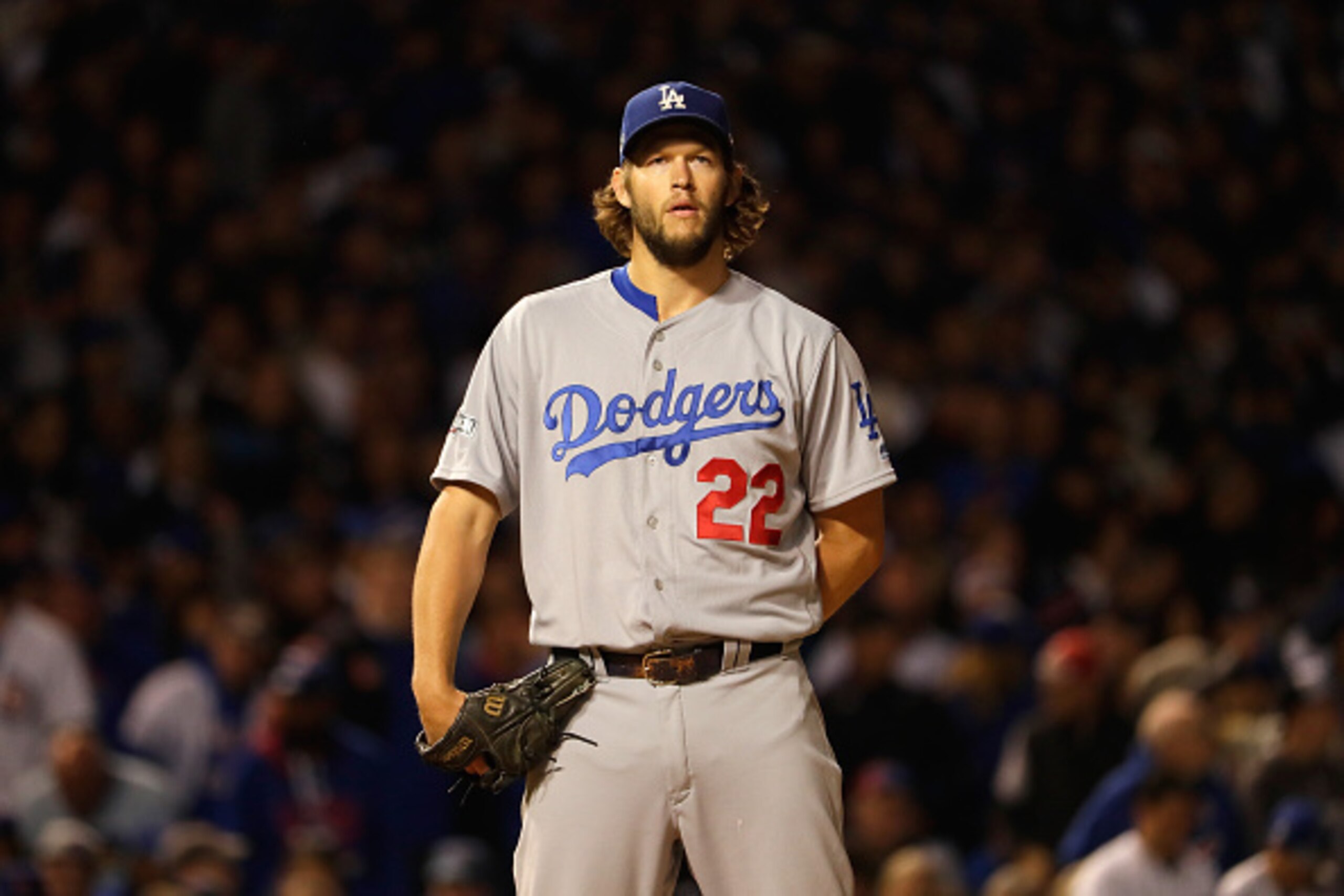 CHICAGO, IL - OCTOBER 22:  Clayton Kershaw #22 of the Los Angeles Dodgers looks on in the first inning against the Chicago Cubs during game six of the National League Championship Series at Wrigley Field on October 22, 2016 in Chicago, Illinois.  (Photo b