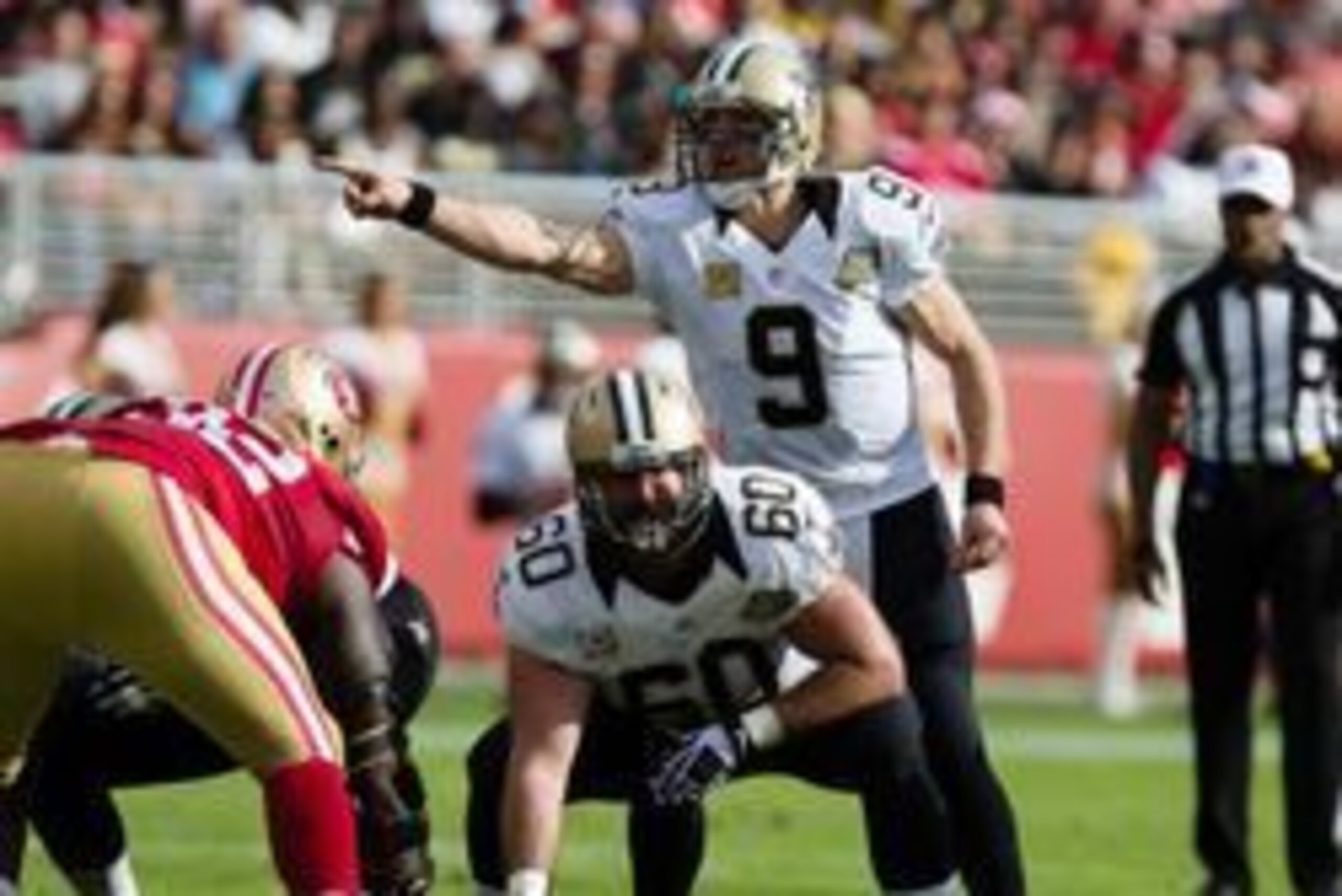 Nov 6, 2016; Santa Clara, CA, USA; New Orleans Saints quarterback Drew Brees (9) calls out before receiving a snap from center Max Unger (60) against the San Francisco 49ers during the second quarter at Levi's Stadium. Mandatory Credit: Kelley L Cox-USA T