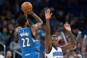 ORLANDO, FL - NOVEMBER 09: Andrew Wiggins #22 of the Minnesota Timberwolves attempts a shot against Jeff Green #34 of the Orlando Magic on November 9, 2016 at Amway Center in Orlando, Florida. NOTE TO USER: User expressly acknowledges and agrees that, by 