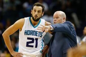 Nov 7, 2016; Charlotte, NC, USA;  Charlotte Hornets head coach Steve Clifford talks with guard Marco Belinelli (21) in the second half against the Indiana Pacers at Spectrum Center. The Hornets defeated the Pacers 122-100. Mandatory Credit: Jeremy Brevard