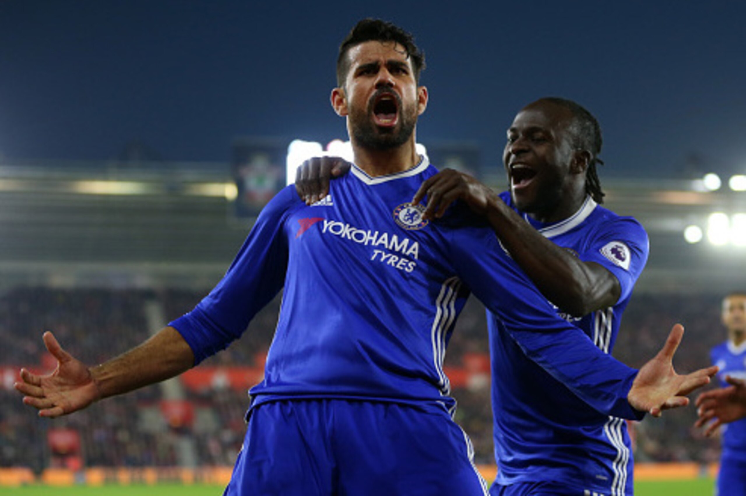 SOUTHAMPTON, ENGLAND - OCTOBER 30: Diego Costa of Chelsea celebrates after scoring to make it 0-2 with Victor Moses of Chelsea during the Premier League match between Southampton and Chelsea at St Mary's Stadium on October 30, 2016 in Southampton, England