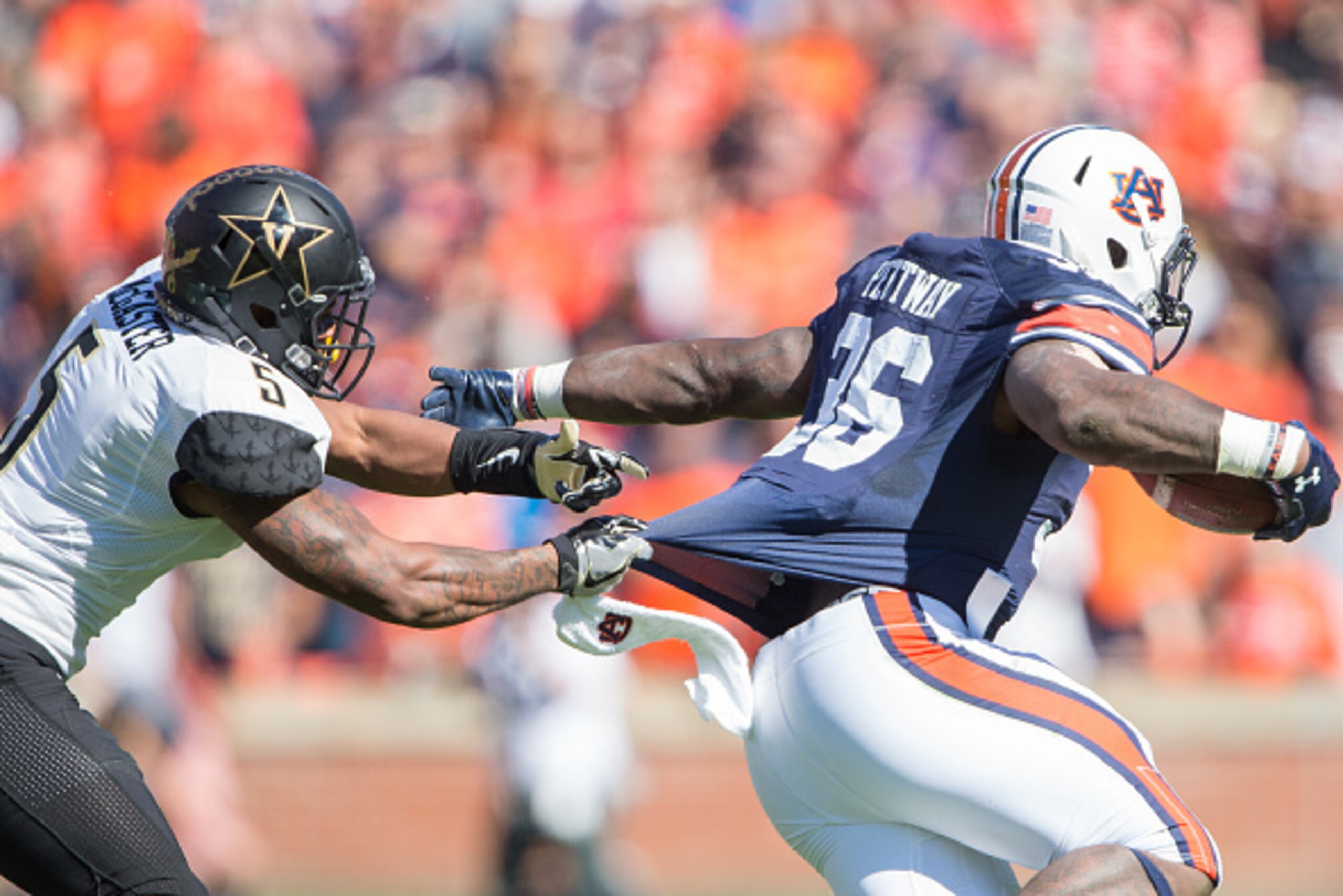 AUBURN, AL - NOVEMBER 5: Cornerback Torren McGaster #5 of the Vanderbilt Commodores attempts to tackle running back Kamryn Pettway #36 of the Auburn Tigers at Jordan-Hare Stadium on November 5, 2016 in Auburn, Alabama. The Auburn Tigers defeated the Vande