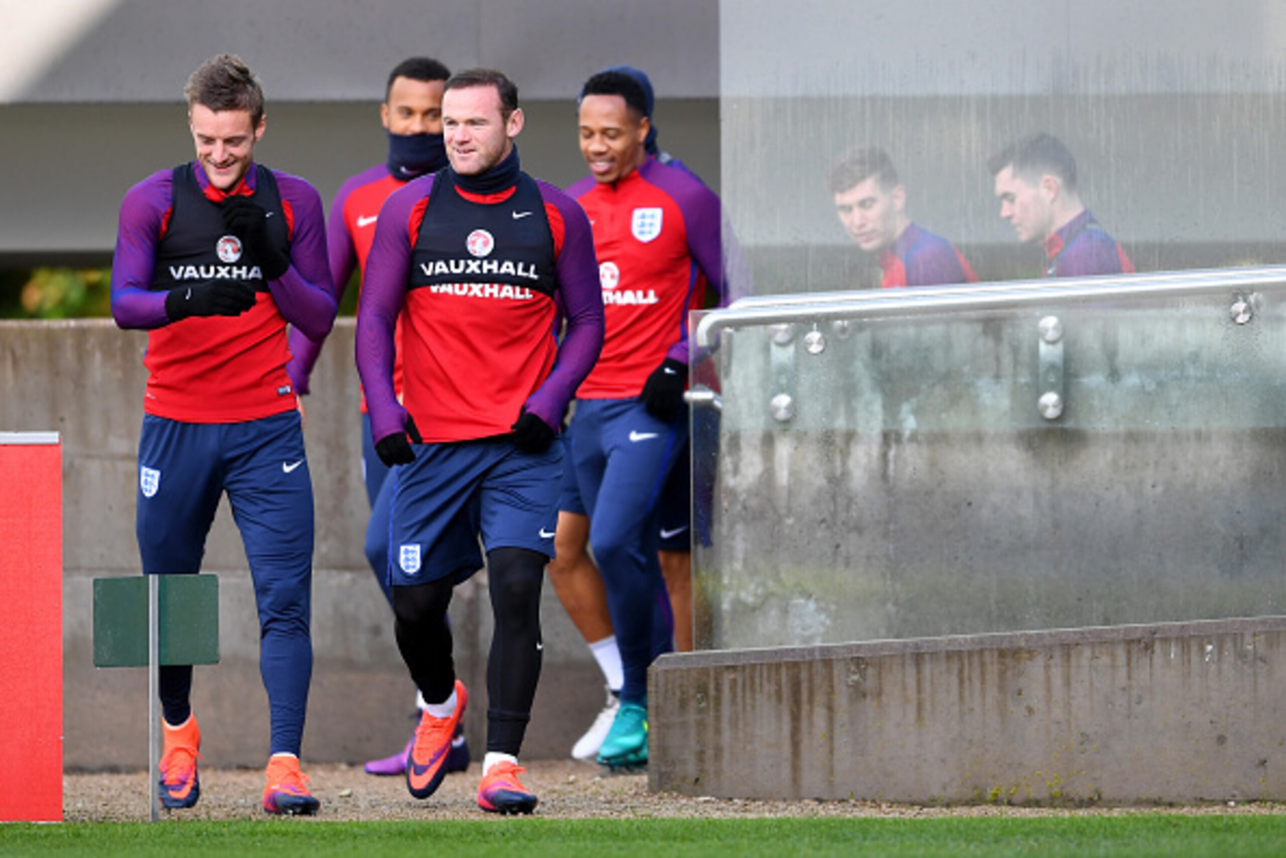 BURTON-UPON-TRENT, ENGLAND - NOVEMBER 10:  Wayne Rooney and Jamie Vardy of England walk out for a training session ahead of the FIFA 2018 World Cup qualifying group F match against Scotland at St George's Park on November 10, 2016 in Burton-upon-Trent, En