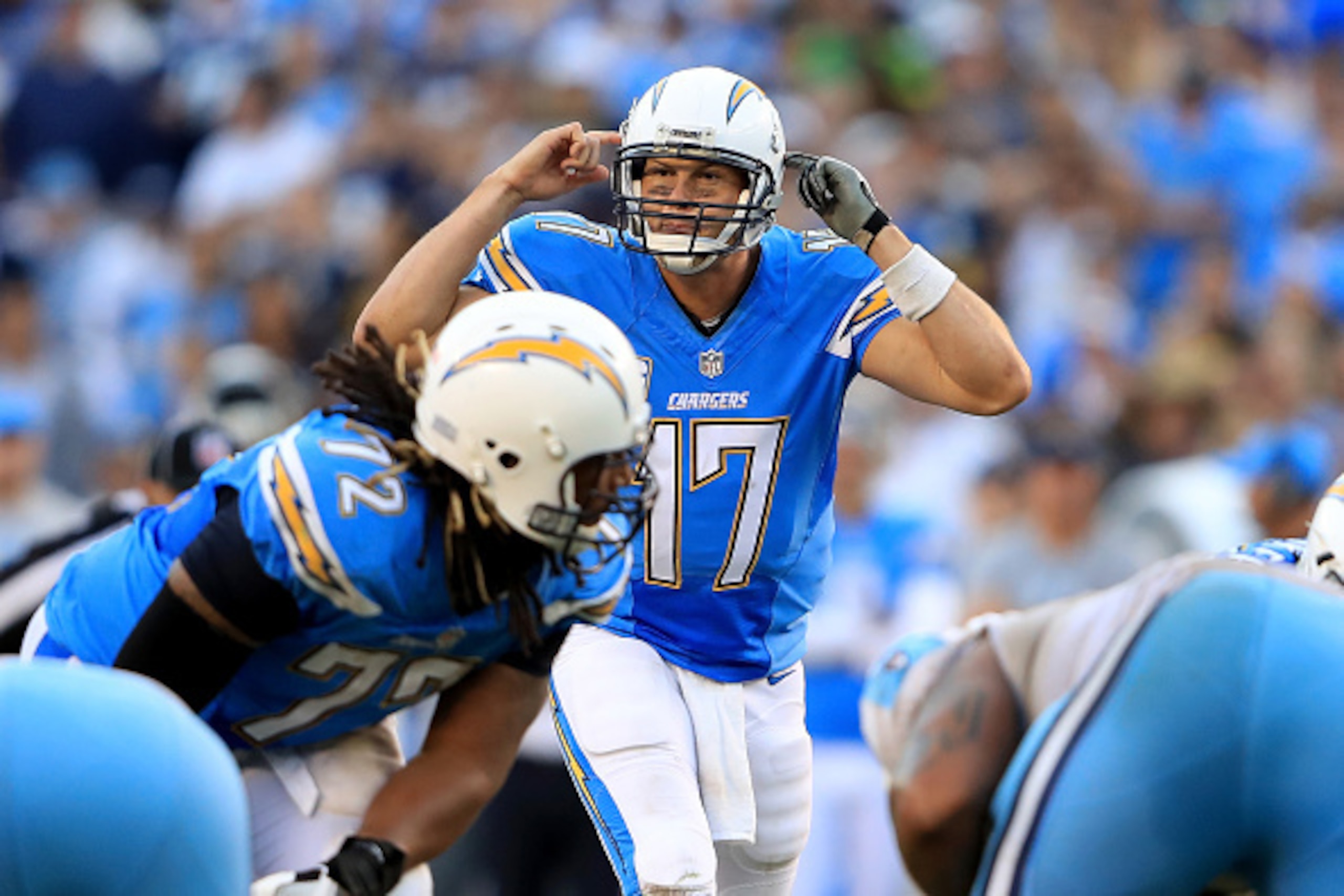 SAN DIEGO, CA - NOVEMBER 06:   Philip Rivers #17 of the San Diego Chargers calls plays at the line of scrimmage during the second half of a game against the Tennessee Titans at Qualcomm Stadium on November 6, 2016 in San Diego, California.  (Photo by Sean