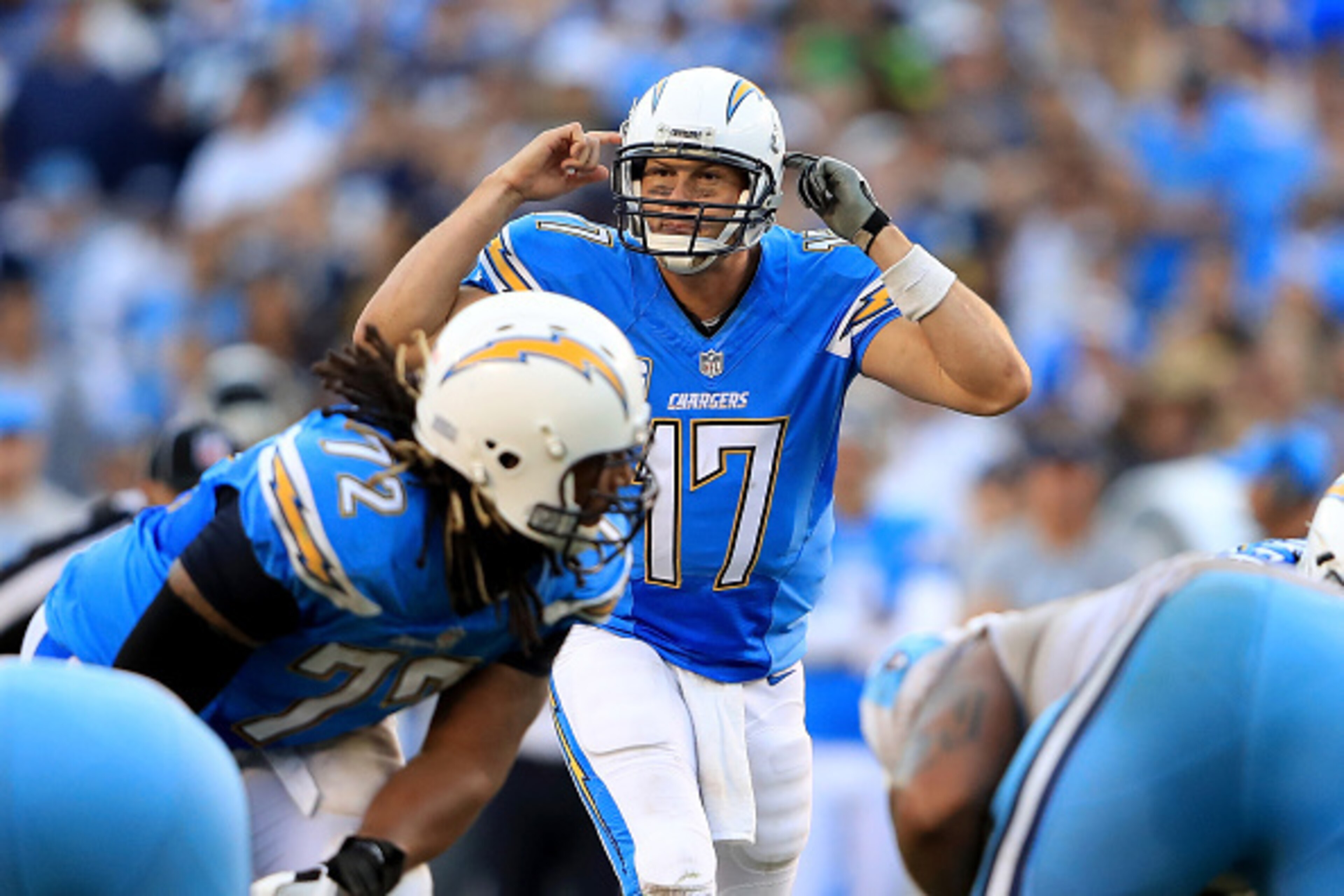 SAN DIEGO, CA - NOVEMBER 06:   Philip Rivers #17 of the San Diego Chargers calls plays at the line of scrimmage during the second half of a game against the Tennessee Titans at Qualcomm Stadium on November 6, 2016 in San Diego, California.  (Photo by Sean