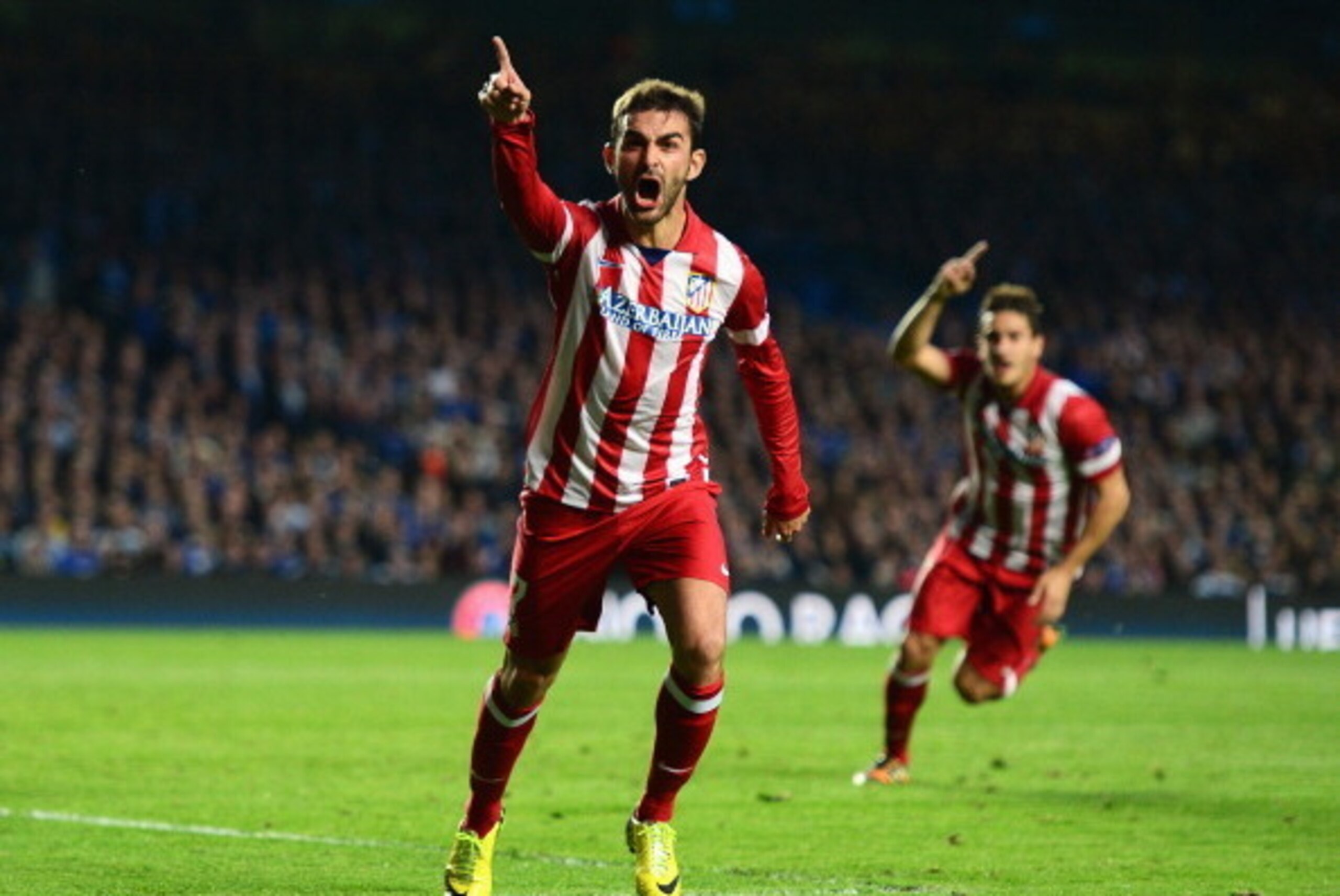 LONDON, ENGLAND - APRIL 30: Adrian Lopez of Club Atletico de Madrid celebrates scoring his goal during the UEFA Champions League semi-final second leg match between Chelsea and Club Atletico de Madrid at Stamford Bridge on April 30, 2014 in London, Englan