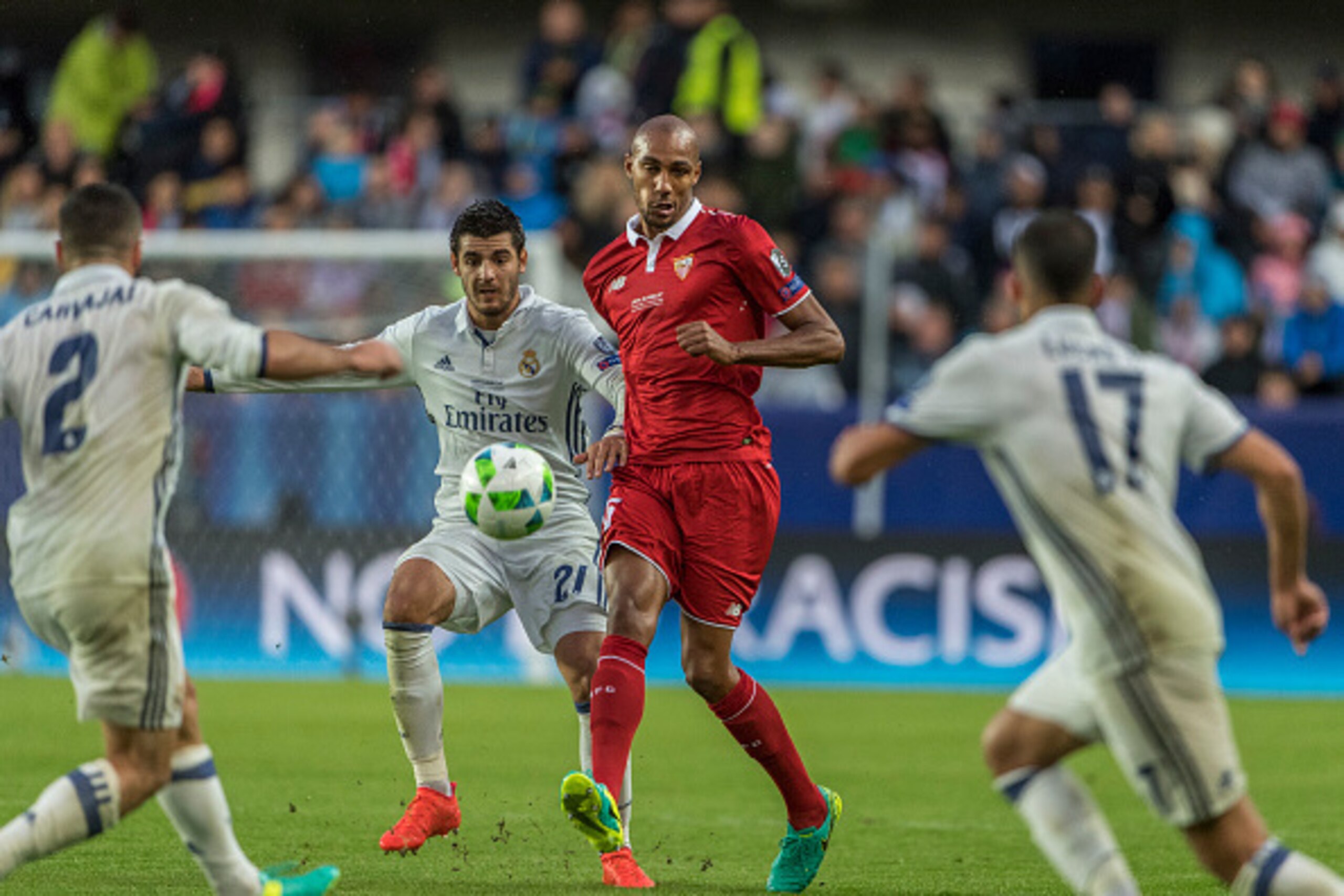 TRONDHEIM, NORWAY - AUGUST 09: Dani Carvajal, Lucas Vazquez  of Real Madrid, Steven N`Zonzi of Sevilla during theUEFA Super Cup match between Real Madrid and Sevilla at the Lerkendal Stadion on August 9, 2016 in Trondheim, Norway. (Photo by Trond Tandberg