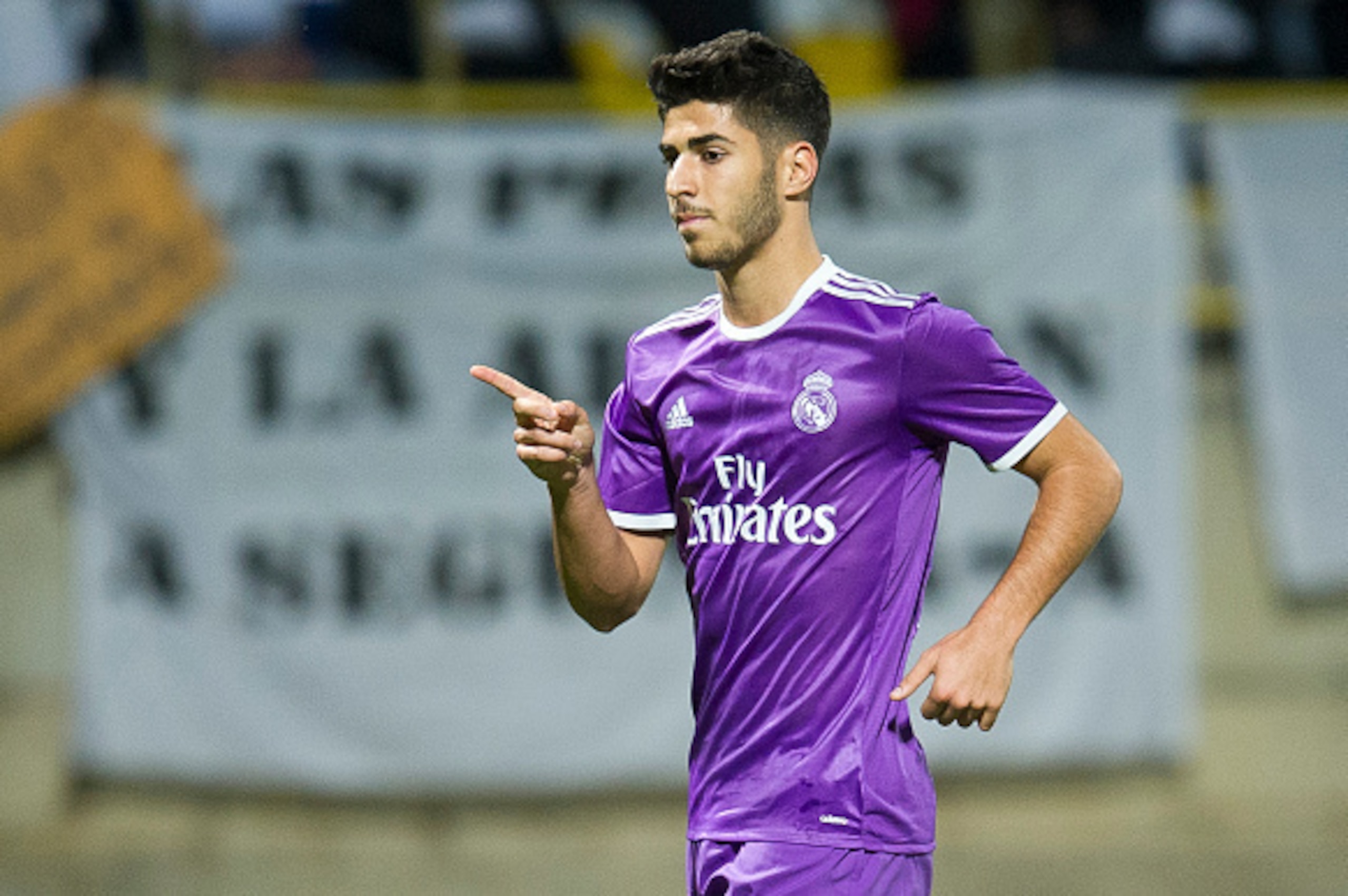 LEON, SPAIN - OCTOBER 26: Marco Asensio of Real Madrid celebrates after scoring his team's second goal during the Copa del Rey Round of 32 match between Cultural Leonesa and Real Madrid CF at Reino de Leon Stadium on October 26, 2016 in Leon, Spain.  (Pho