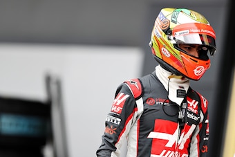 NORTHAMPTON, ENGLAND - JULY 09: Esteban Gutierrez of Mexico and Haas F1 walks in the Pitlane during qualifying for the Formula One Grand Prix of Great Britain at Silverstone on July 9, 2016 in Northampton, England.  (Photo by Mark Thompson/Getty Images)