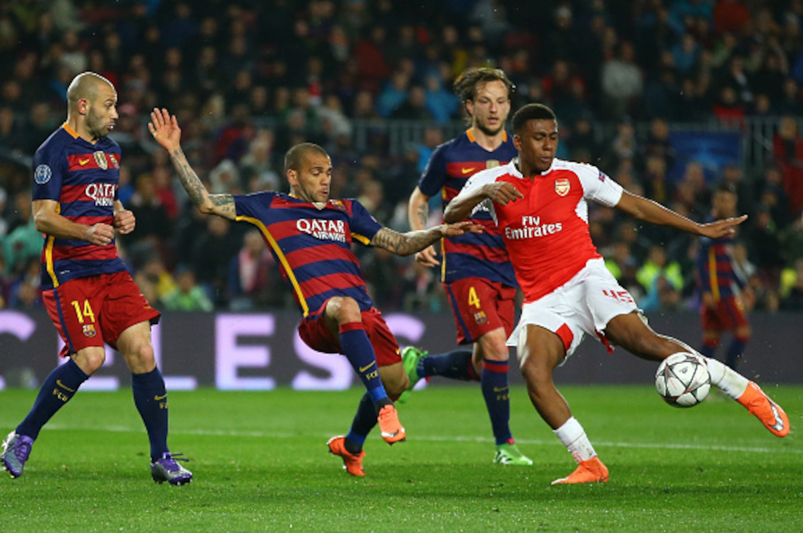 BARCELONA, SPAIN - MARCH 16: Alex Iwobi of Arsenal shoots at goal during the UEFA Champions League round of 16, second Leg match between FC Barcelona and Arsenal FC at Camp Nou on March 16, 2016 in Barcelona, Spain. (Photo by Richard Heathcote/Getty Ima BARCELONA, SPAIN - MARCH 16: Alex Iwobi of Arsenal shoots at goal during the UEFA Champions League round of 16, second Leg match between FC Barcelona and Arsenal FC at Camp Nou on March 16, 2016 in Barcelona, Spain. (Photo by Richard Heathcote/Getty Ima