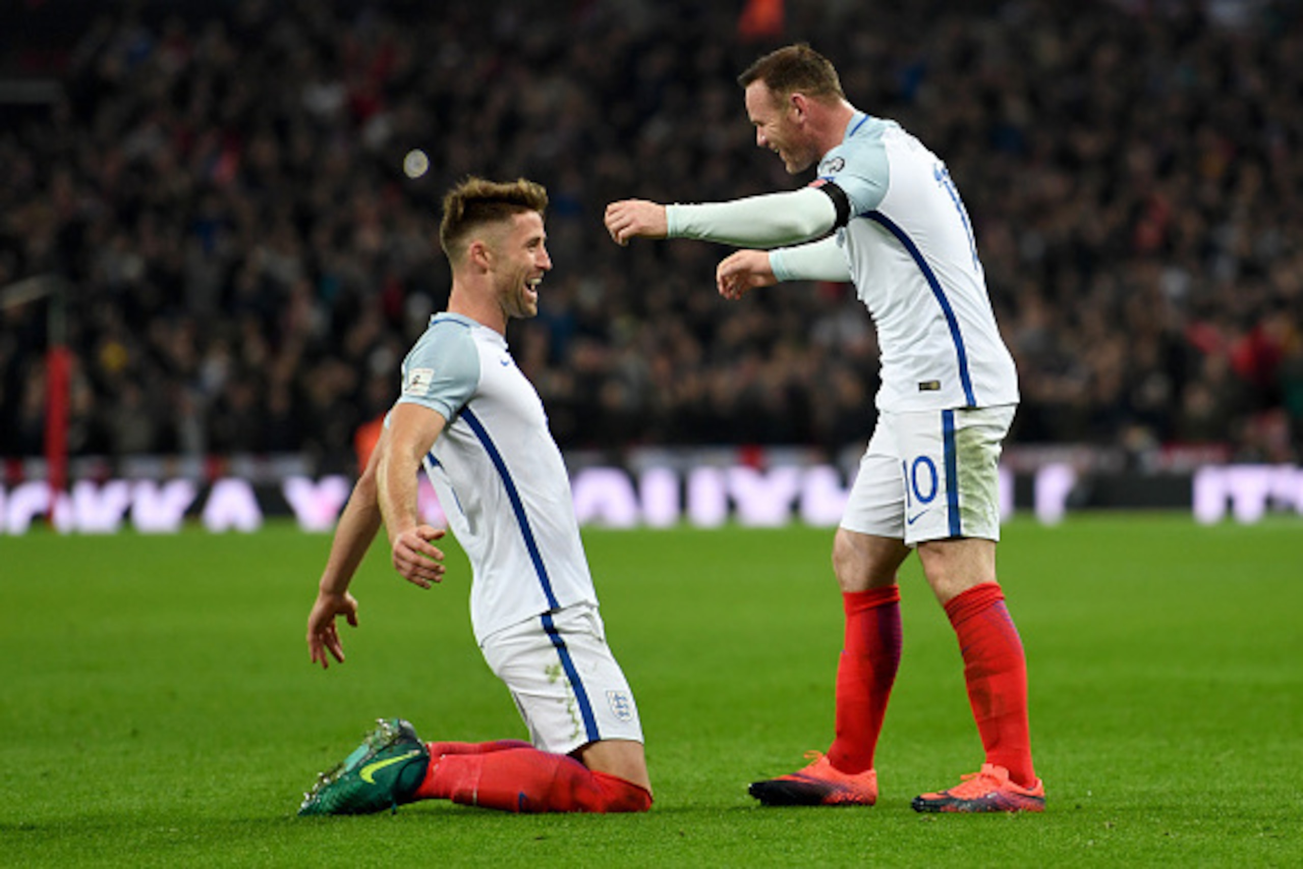 LONDON, ENGLAND - NOVEMBER 11:  Gary Cahill of England celebrates with Wayne Rooney after scoring their third goal during the FIFA 2018 World Cup qualifying match between England and Scotland at Wembley Stadium on November 11, 2016 in London, England.  (P