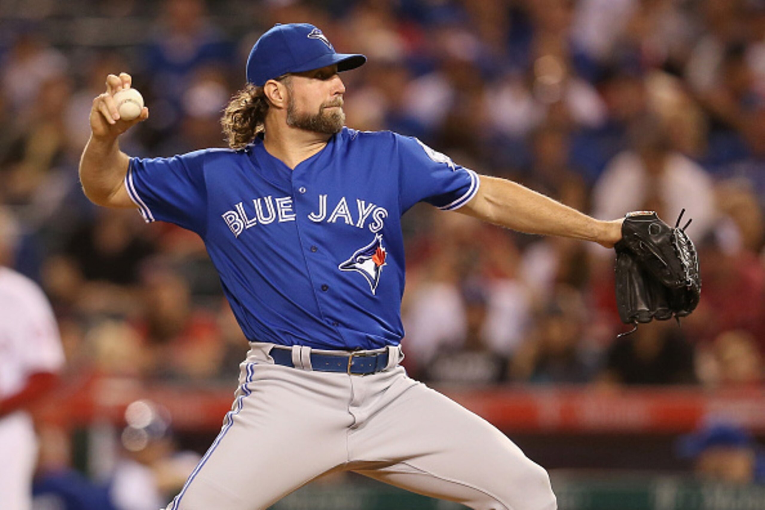 ANAHEIM, CALIFORNIA - SEPTEMBER 16:  R.A. Dickey #43 of the Toronto Blue Jays throws a pitch in the first inning against the Los Angeles Angels of Anaheim at Angel Stadium of Anaheim on September 16, 2016 in Anaheim, California.  (Photo by Stephen Dunn/Ge