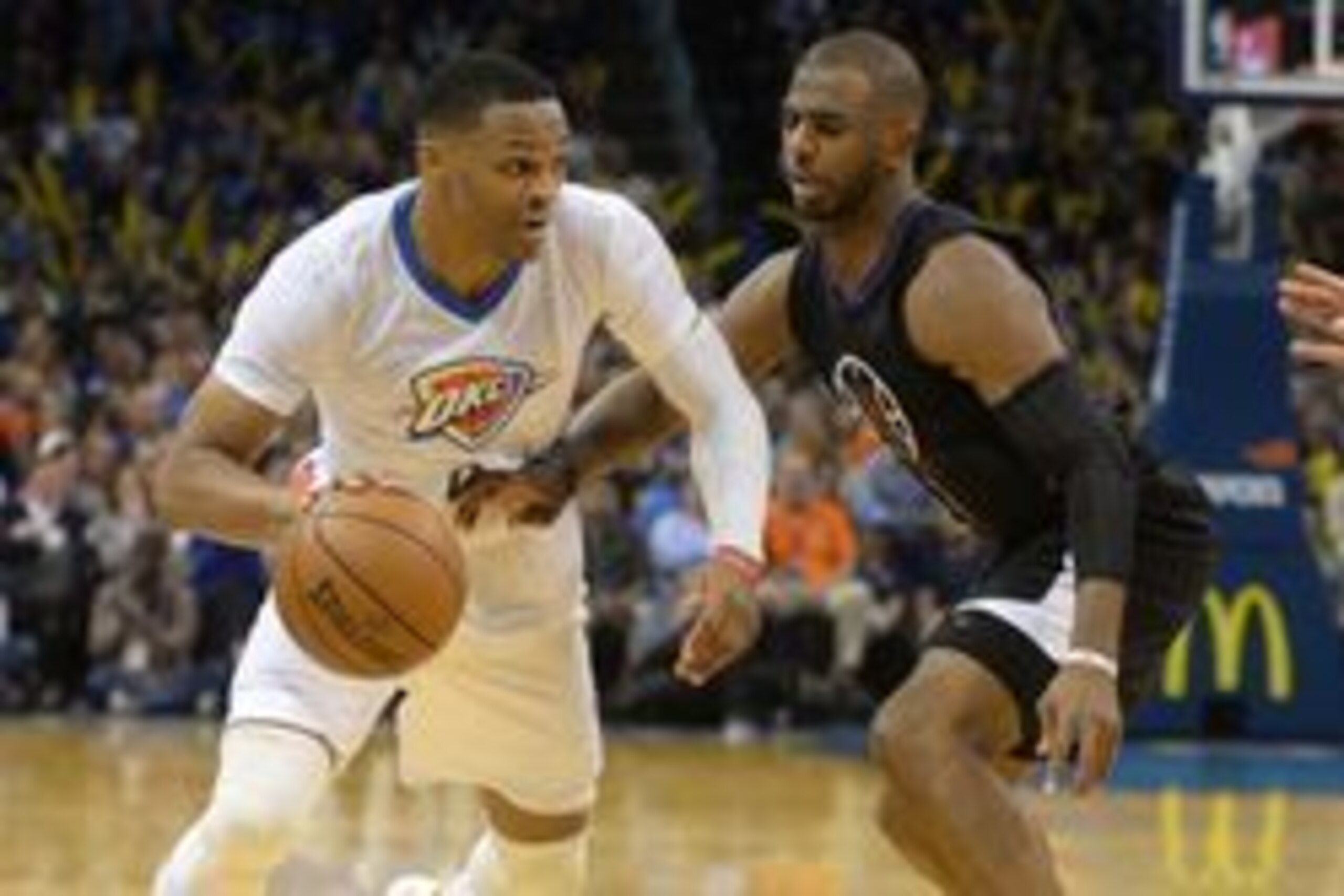 Nov 11, 2016; Oklahoma City, OK, USA; Oklahoma City Thunder guard Russell Westbrook (0) handles the ball against LA Clippers guard Chris Paul (3) during the fourth quarter at Chesapeake Energy Arena. Mandatory Credit: Mark D. Smith-USA TODAY Sports