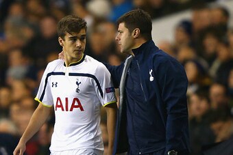 LONDON, ENGLAND - NOVEMBER 27:  Manager Mauricio Pochettino of Spurs speaks to Harry Winks of Spurs as he prepares to come on as a substitute during the UEFA Europa League group C match between Tottenham Hotspur FC and FK Partizan at White Hart Lane on No