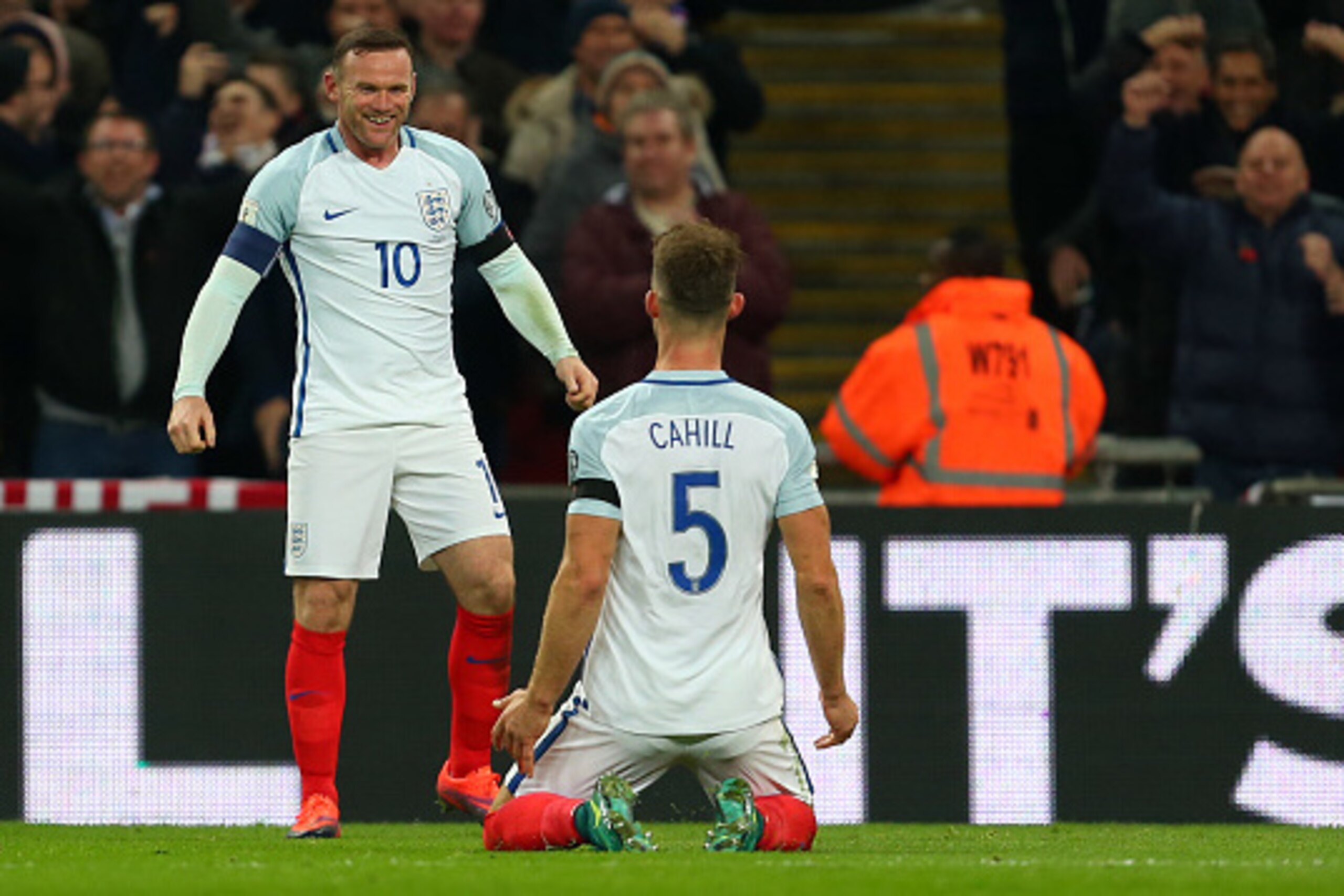 LONDON, ENGLAND - NOVEMBER 11: Gary Cahill of England celebrates after scoring to make it 3-0 with Wayne Rooney of England during the FIFA 2018 World Cup Qualifier between England and Scotland at Wembley Stadium on November 11, 2016 in London, England. (P