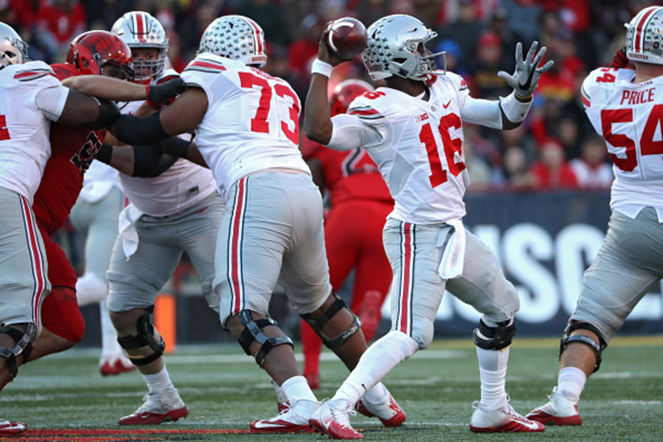 COLLEGE PARK, MD - NOVEMBER 12: Quarterback J.T. Barrett #16 of the Ohio State Buckeyes throws a touchdown pass to Curtis Samuel (not pictured) against the Maryland Terrapins during the first quarter at Capital One Field at Maryland Stadium on November 12