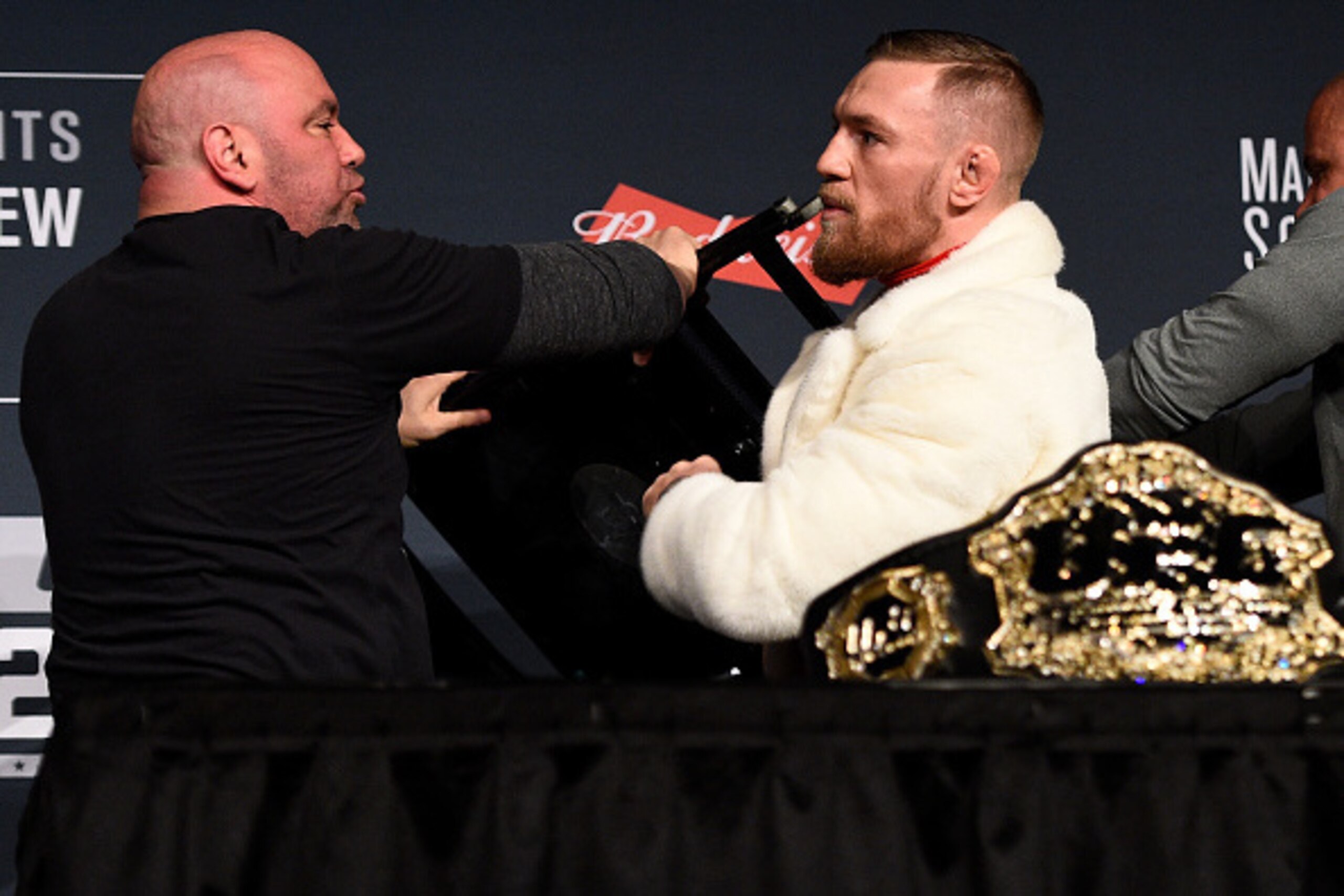 NEW YORK, NY - NOVEMBER 10: UFC featherweight champion Conor McGregor of Ireland is restrained by UFC president Dana White during the UFC 205 press conference inside The Theater at Madison Square Garden on November 10, 2016 in New York City. (Photo by Je NEW YORK, NY - NOVEMBER 10: UFC featherweight champion Conor McGregor of Ireland is restrained by UFC president Dana White during the UFC 205 press conference inside The Theater at Madison Square Garden on November 10, 2016 in New York City. (Photo by Je