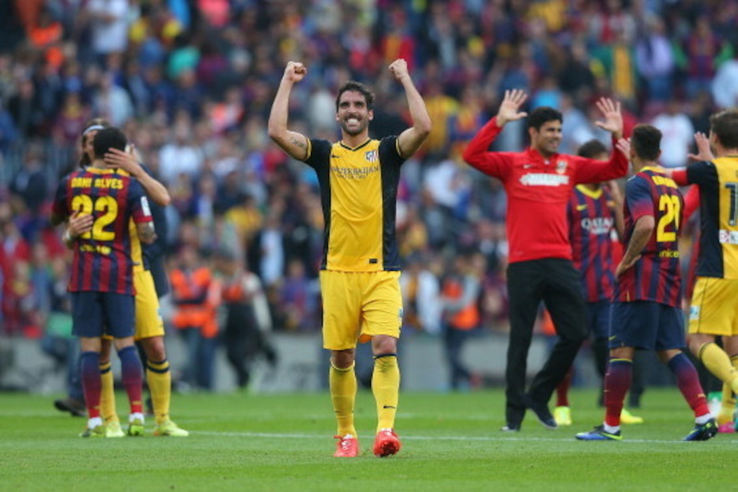 BARCELONA, SPAIN - MAY 17:  Raul Garcia of Club Atletico de Madrid celebrates winning the La Liga after the match between FC Barcelona and Club Atletico de Madrid at Camp Nou on May 17, 2014 in Barcelona, Spain.  (Photo by Alex Livesey/Getty Images)