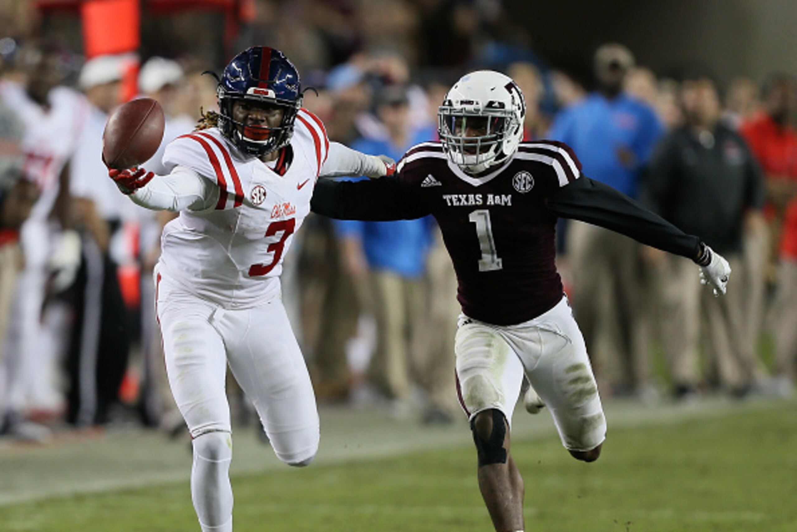 COLLEGE STATION, TX - NOVEMBER 12:  Damore'ea Stringfellow #3 of the Mississippi Rebels makes a one handed catch in the fourth quarter as he gets behind Nick Harvey #1 of the Texas A&M Aggies at Kyle Field on November 12, 2016 in College Station, Texas.  