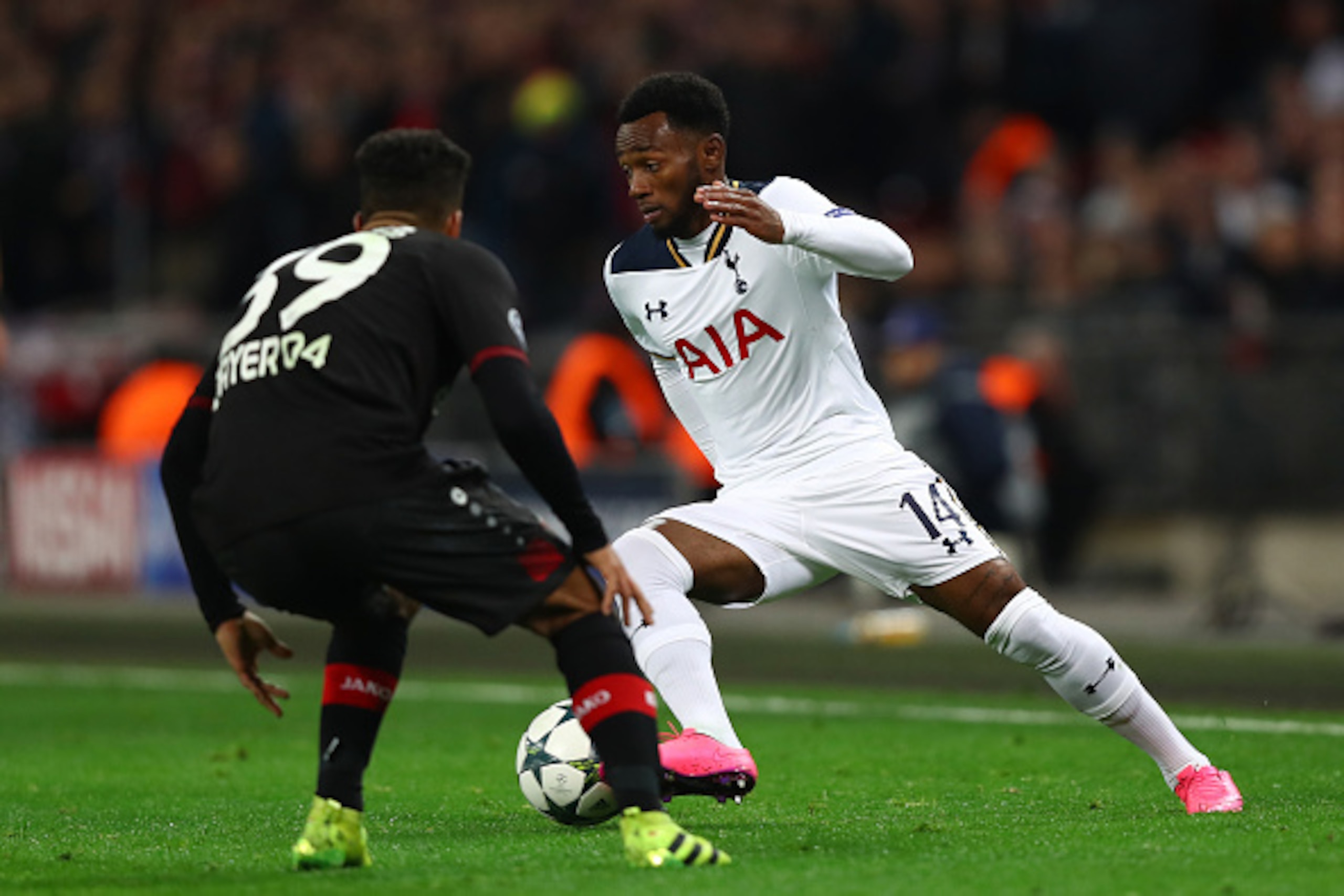 LONDON, ENGLAND - NOVEMBER 02: Georges-Kevin Nkoudou of Tottenham Hotspur takes on Benjamin Henrichs of Bayer Leverkusen during the UEFA Champions League Group E match between Tottenham Hotspur FC and Bayer 04 Leverkusen at Wembley Stadium on November 2, 