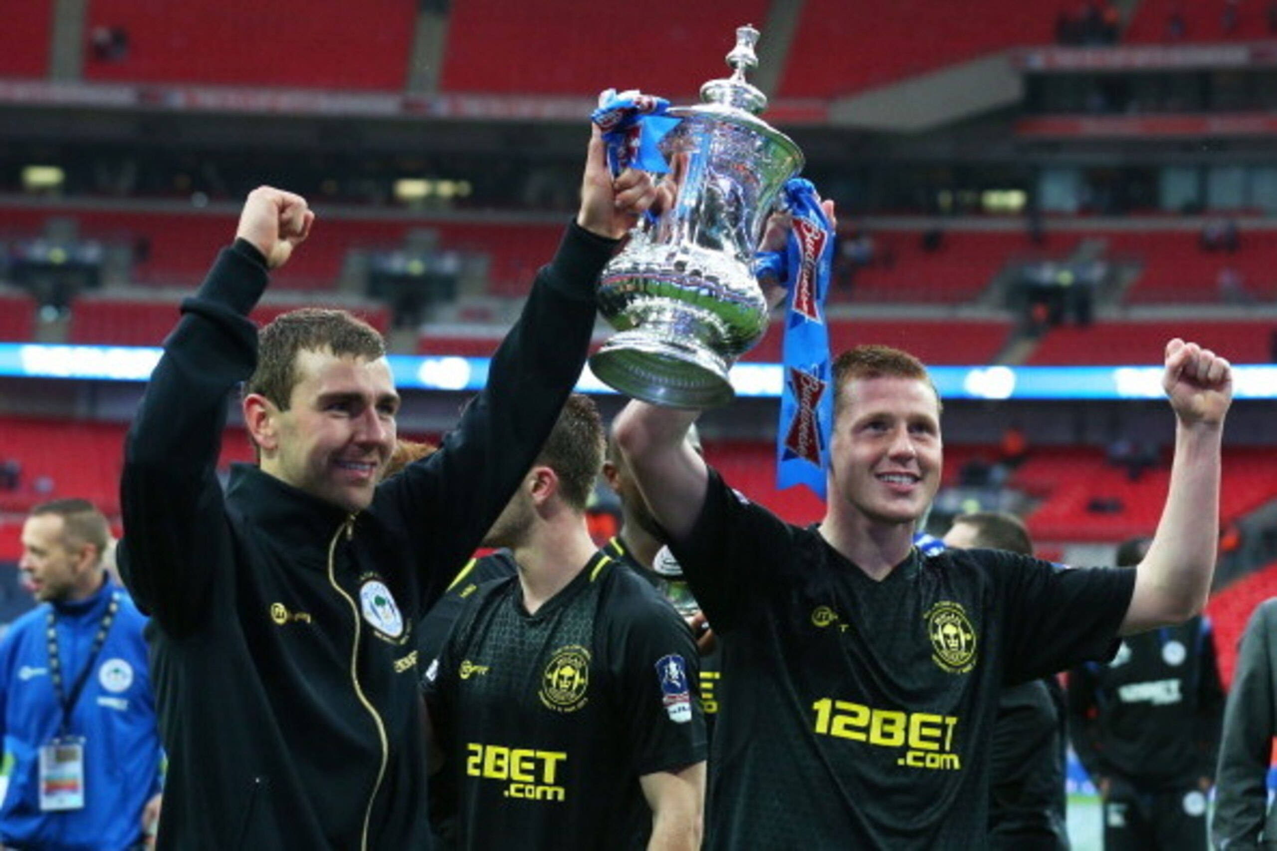 LONDON, ENGLAND - MAY 11:  James McArthur (L) and James McCarthy of Wigan Athletic celebrate victory after the FA Cup with Budweiser Final between Manchester City and Wigan Athletic at Wembley Stadium on May 11, 2013 in London, England.  (Photo by Alex Li