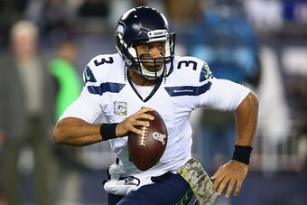 FOXBORO, MA - NOVEMBER 13:  Russell Wilson #3 of the Seattle Seahawks looks to throw the ball during the first quarter of a game against the New England Patriots at Gillette Stadium on November 13, 2016 in Foxboro, Massachusetts.  (Photo by Adam Glanzman/