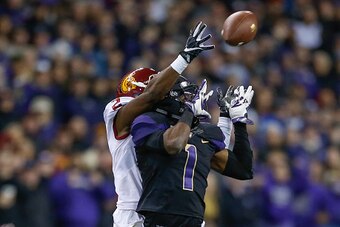 SEATTLE, WA - NOVEMBER 12:  Defensive back Adoree' Jackson #2 of the USC Trojans breaks up a pass against wide receiver John Ross #1 of the Washington Huskies rushes on November 12, 2016 at Husky Stadium in Seattle, Washington. The Trojans defeated the Hu