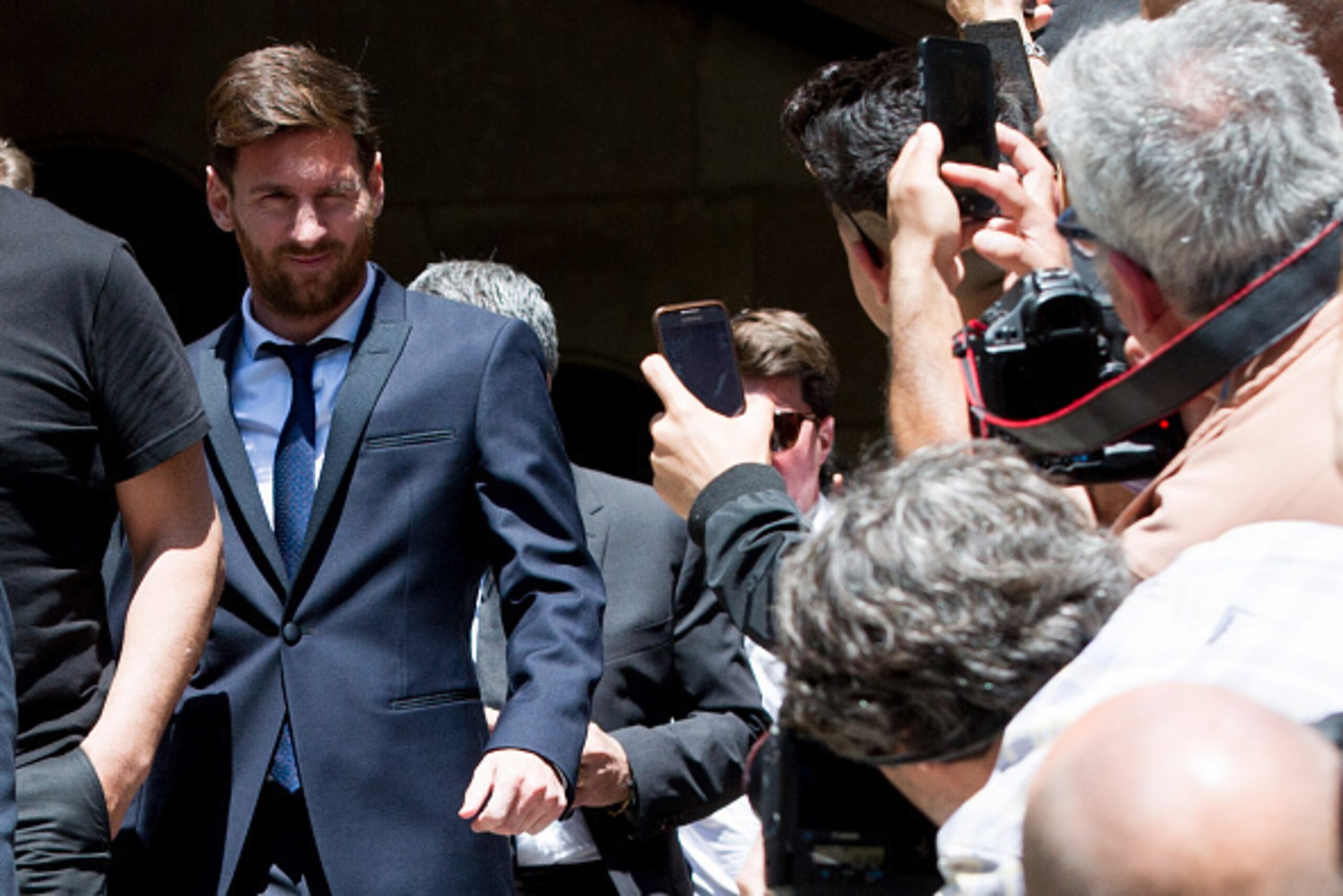 BARCELONA, SPAIN - JUNE 02: Lionel Messi of FC Barcelona leaves the courthouse on June 2, 2016 in Barcelona, Spain. Lionel Messi and his father Jorge Messi, who manages his financial affairs, are accused of defrauding the Spanish Tax Agency of 4.1 million
