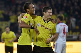 When team-mates turn foes: Aubameyang and Robert Lewandowski have haunted Bundesliga defences for years.