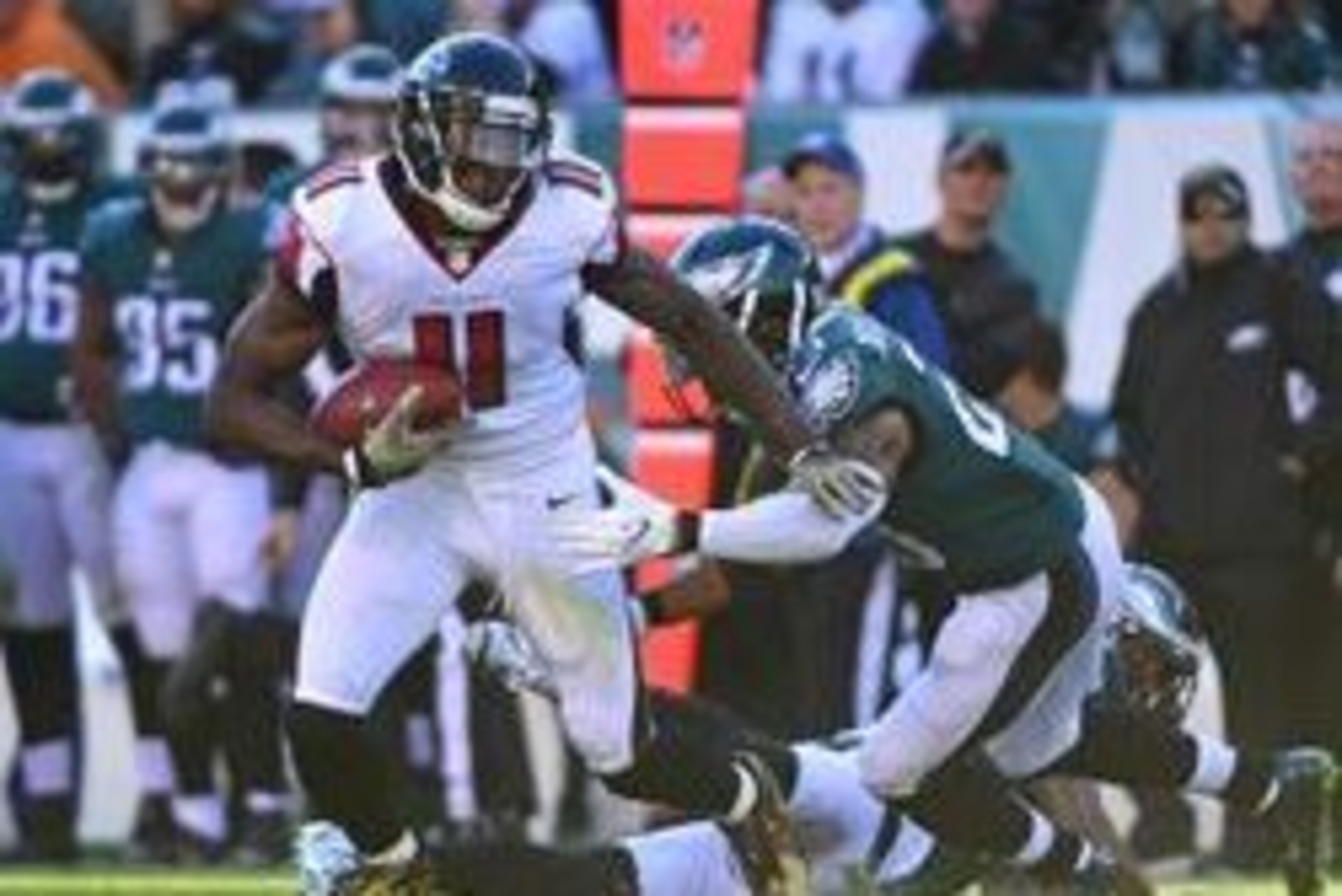 Nov 13, 2016; Philadelphia, PA, USA; Atlanta Falcons wide receiver Julio Jones (11) is tackled by Philadelphia Eagles free safety Rodney McLeod (23) during the second quarter at Lincoln Financial Field. The Eagles defeated the Falcons, 24-15. Mandatory Cr