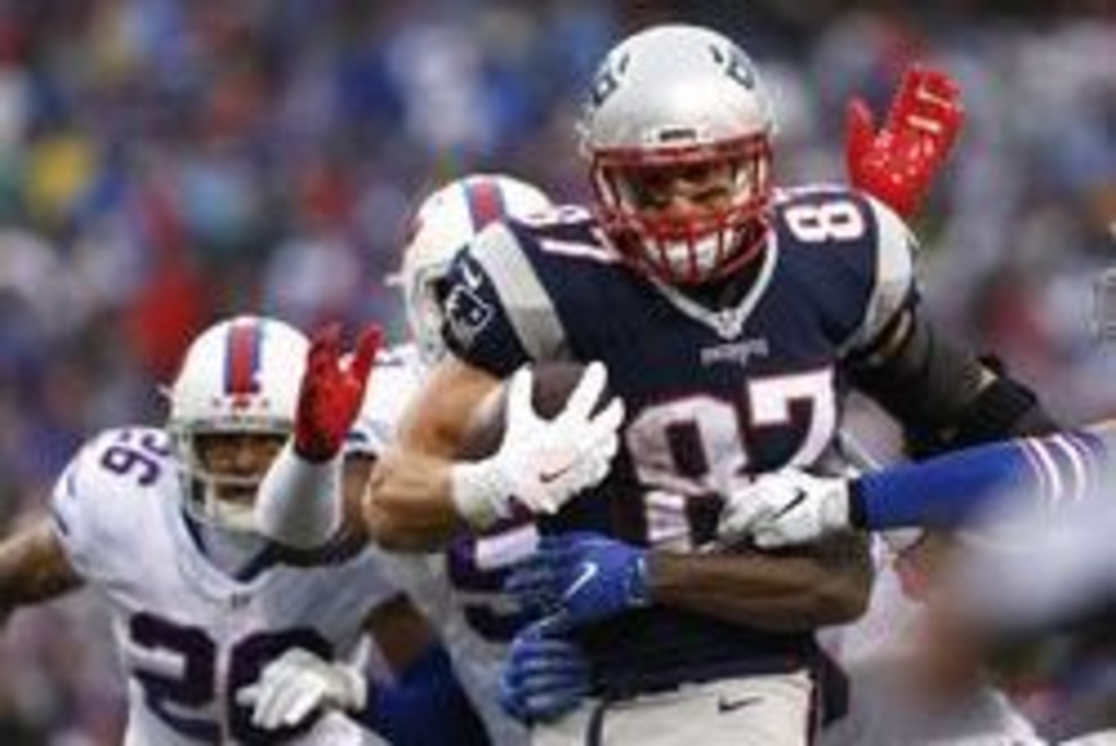Oct 30, 2016; Orchard Park, NY, USA; The Buffalo Bills defense tries to tackle New England Patriots tight end Rob Gronkowski (87) during the second half at New Era Field. The Patriots beat the Bills 41-25. Mandatory Credit: Kevin Hoffman-USA TODAY Sports