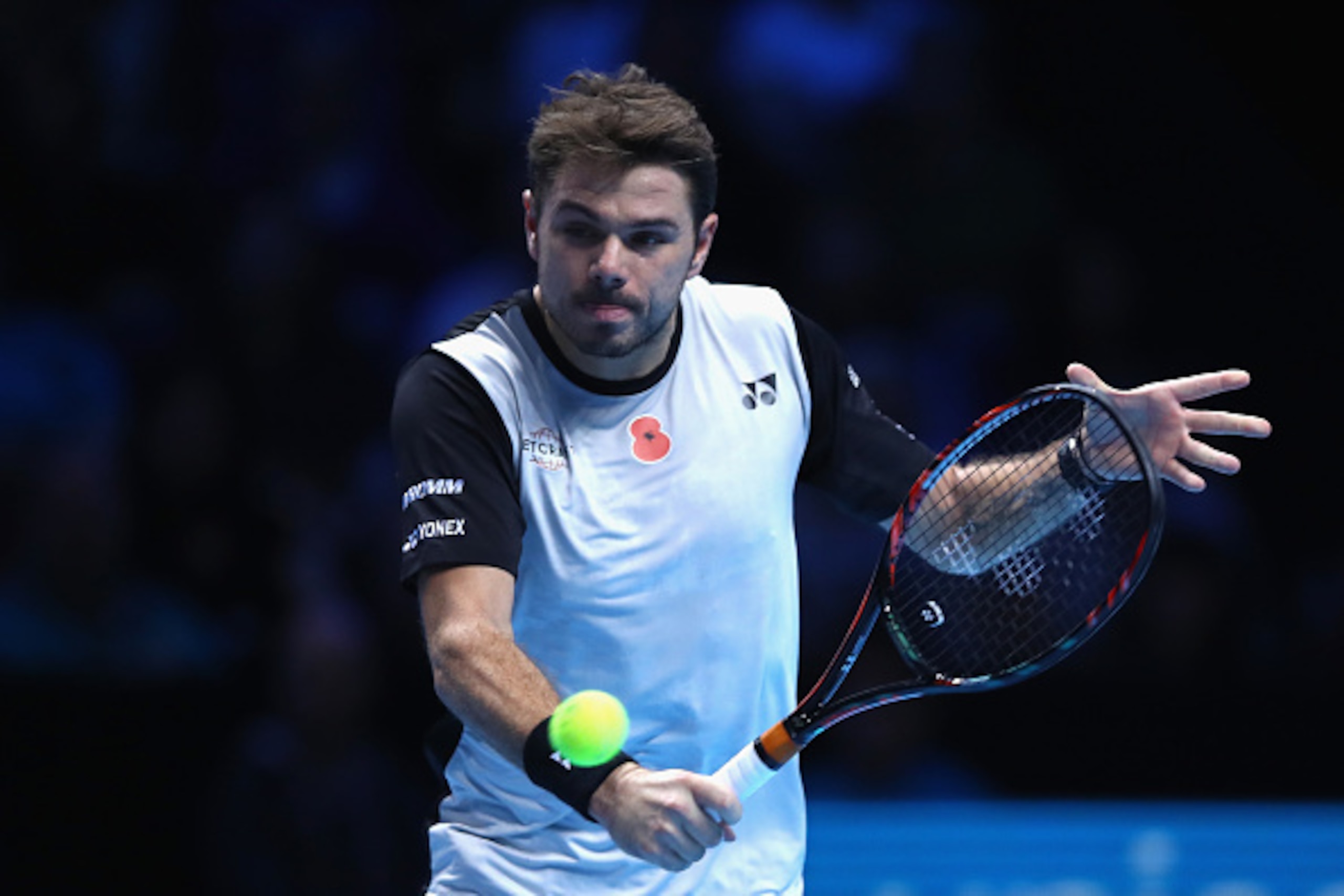 LONDON, ENGLAND - NOVEMBER 14: Stan Wawrinka of Switzerland plays a backhand during his mens singles match against Kei Nishikori of Japan on day two of the ATP World Tour Finals at at O2 Arena on November 14, 2016 in London, England.  (Photo by Clive Brun