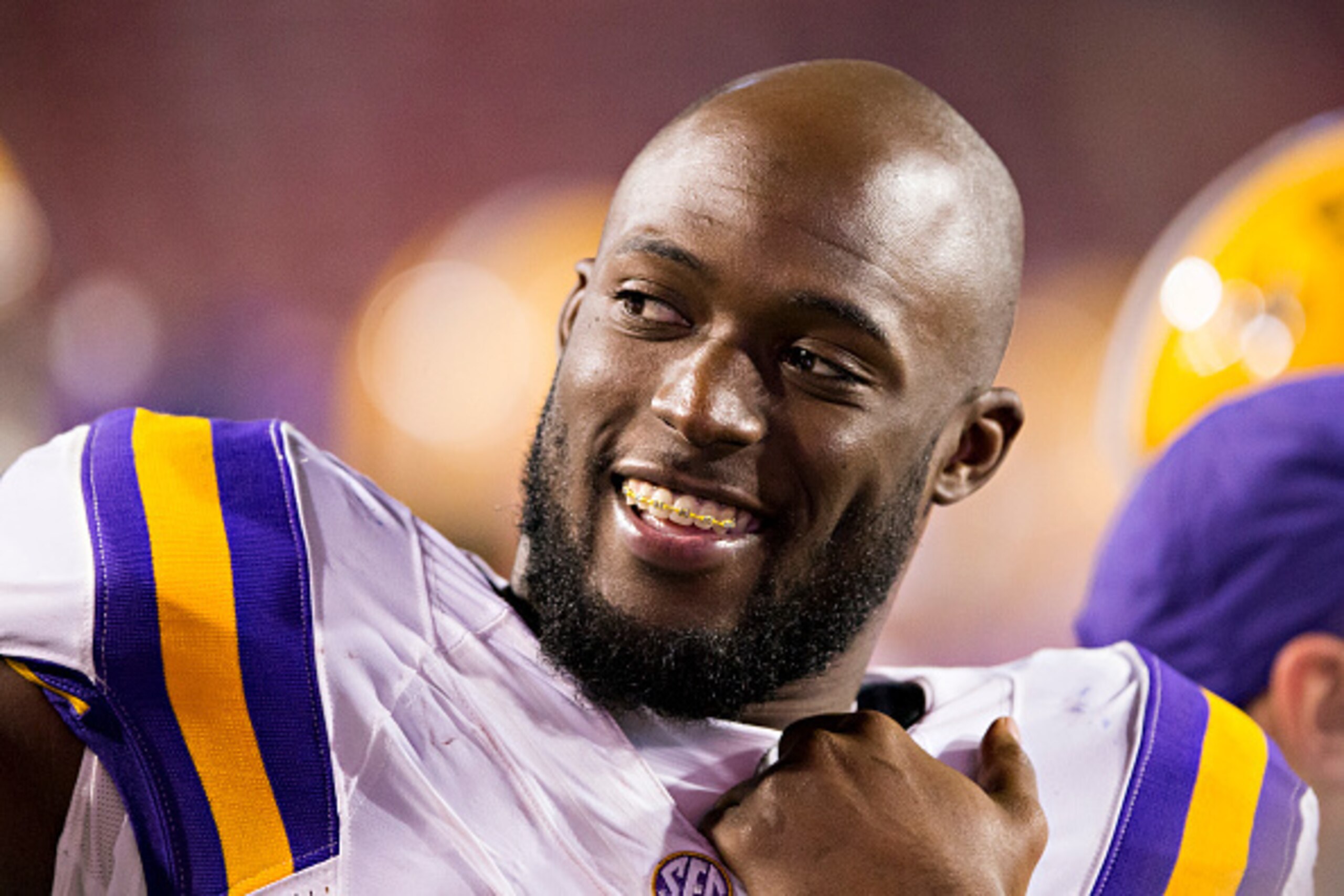 FAYETTEVILLE, AR - NOVEMBER 12:  Leonard Fournette #7 of the LSU Tigers is all smiles on the sidelines during a game against the Arkansas Razorbacks at Razorback Stadium on November 12, 2016 in Fayetteville, Arkansas.  The Tigers defeated the Razorbacks 3