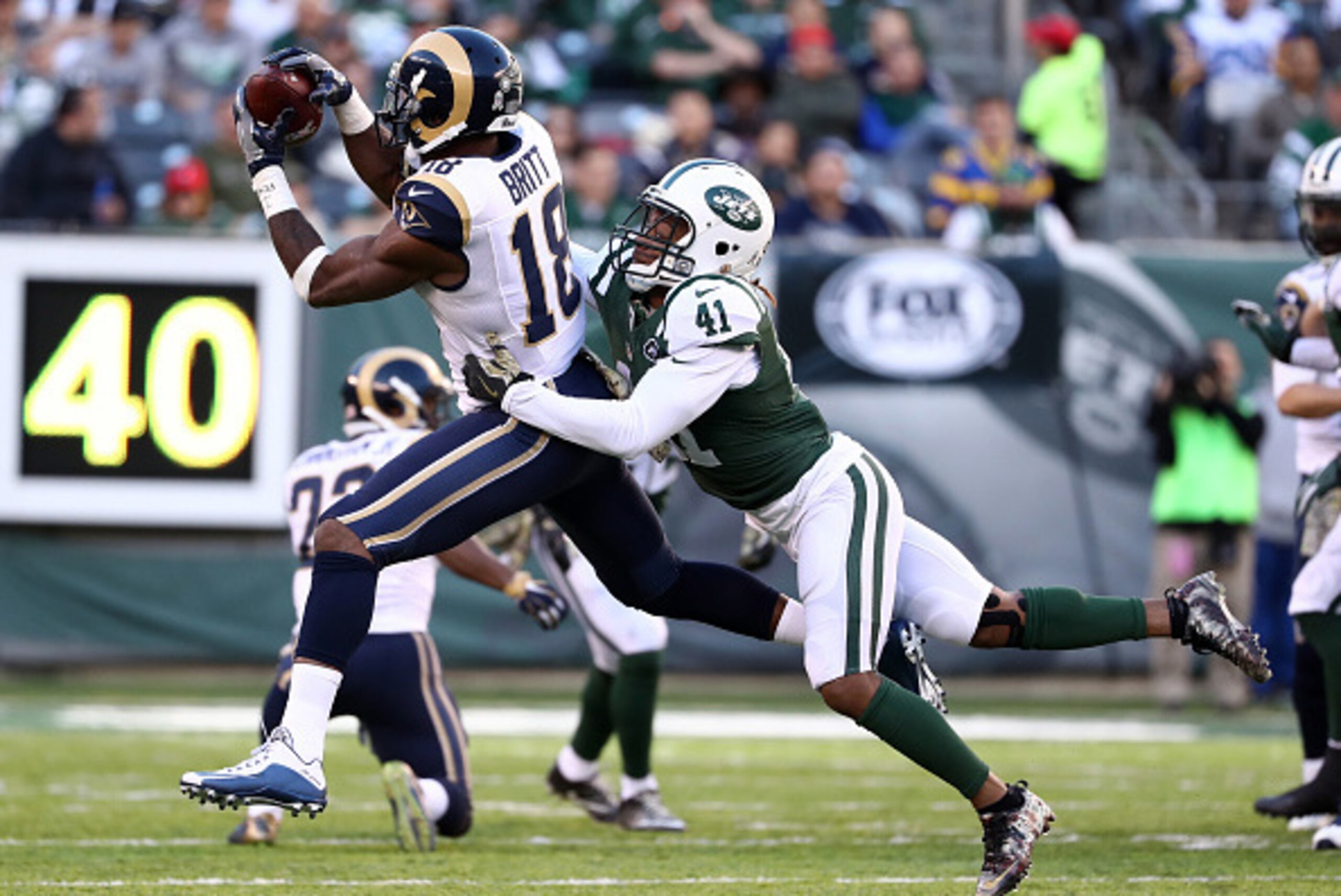 EAST RUTHERFORD, NJ - NOVEMBER 13:  Kenny Britt #18 of the Los Angeles Rams makes a catch against Buster Skrine #41 of the New York Jets in the fourth quarter at MetLife Stadium on November 13, 2016 in East Rutherford, New Jersey.  (Photo by Al Bello/Gett
