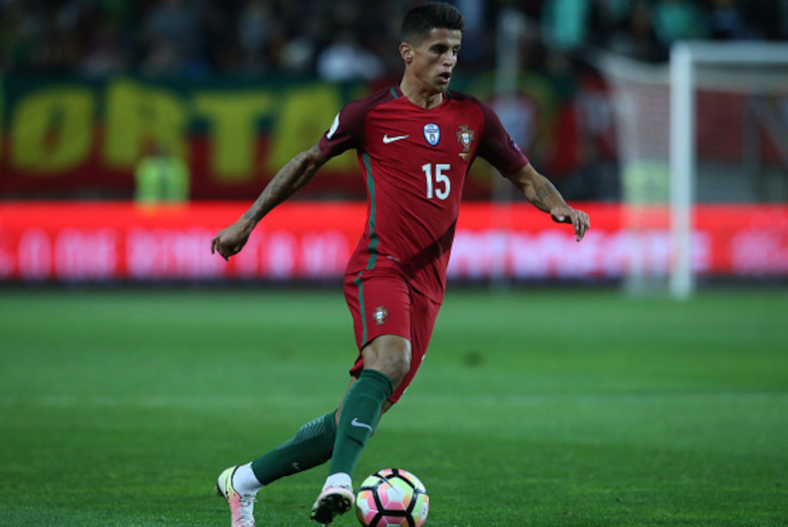 FARO, PORTUGAL - NOVEMBER 13: Portugal's defender Joao Cancelo in action during the FIFA 2018 World Cup Qualifier match between Portugal and Latvia at Estadio Algarve on November 13, 2016 in Faro, Portugal. (Photo by Gualter Fatia/Getty Images) FARO, PORTUGAL - NOVEMBER 13: Portugal's defender Joao Cancelo in action during the FIFA 2018 World Cup Qualifier match between Portugal and Latvia at Estadio Algarve on November 13, 2016 in Faro, Portugal. (Photo by Gualter Fatia/Getty Images)