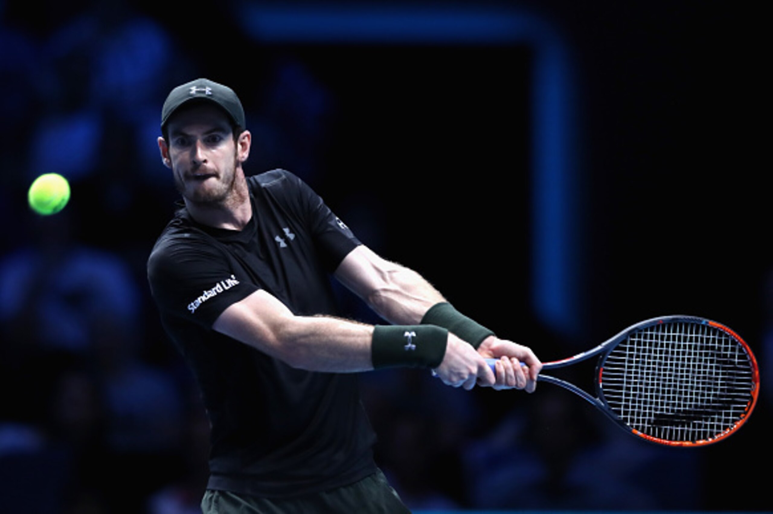 LONDON, ENGLAND - NOVEMBER 14:  Andy Murray of Great Britain plays a backhand during the mens singles match against Marin Cilic of Croatia on day two of the ATP World Tour Finals at at O2 Arena on November 14, 2016 in London, England.  (Photo by Julian Fi