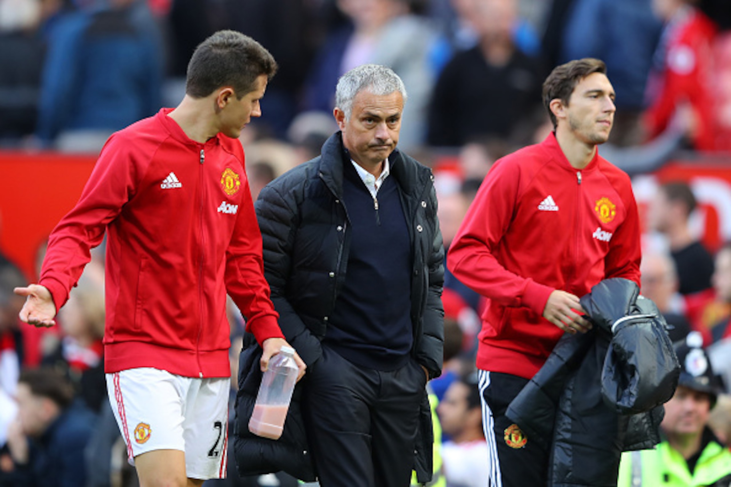 MANCHESTER, ENGLAND - OCTOBER 02:  Ander Herrera of Manchester United (L) speaks to Jose Mourinho, Manager of Manchester United (R) after the final whistle during the Premier League match between Manchester United and Stoke City at Old Trafford on October