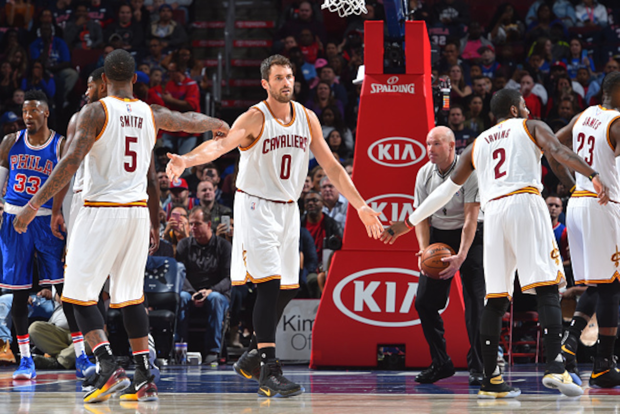 PHILADELPHIA,PA - NOVEMBER 5:  Kevin Love #0,  Kyrie Irving #2 and  J.R. Smith #5 of the Cleveland Cavaliers shake hands against the Philadelphia 76ers during game at the Wells Fargo Center on November 5, 2016 in Philadelphia, Pennsylvania NOTE TO USER: U