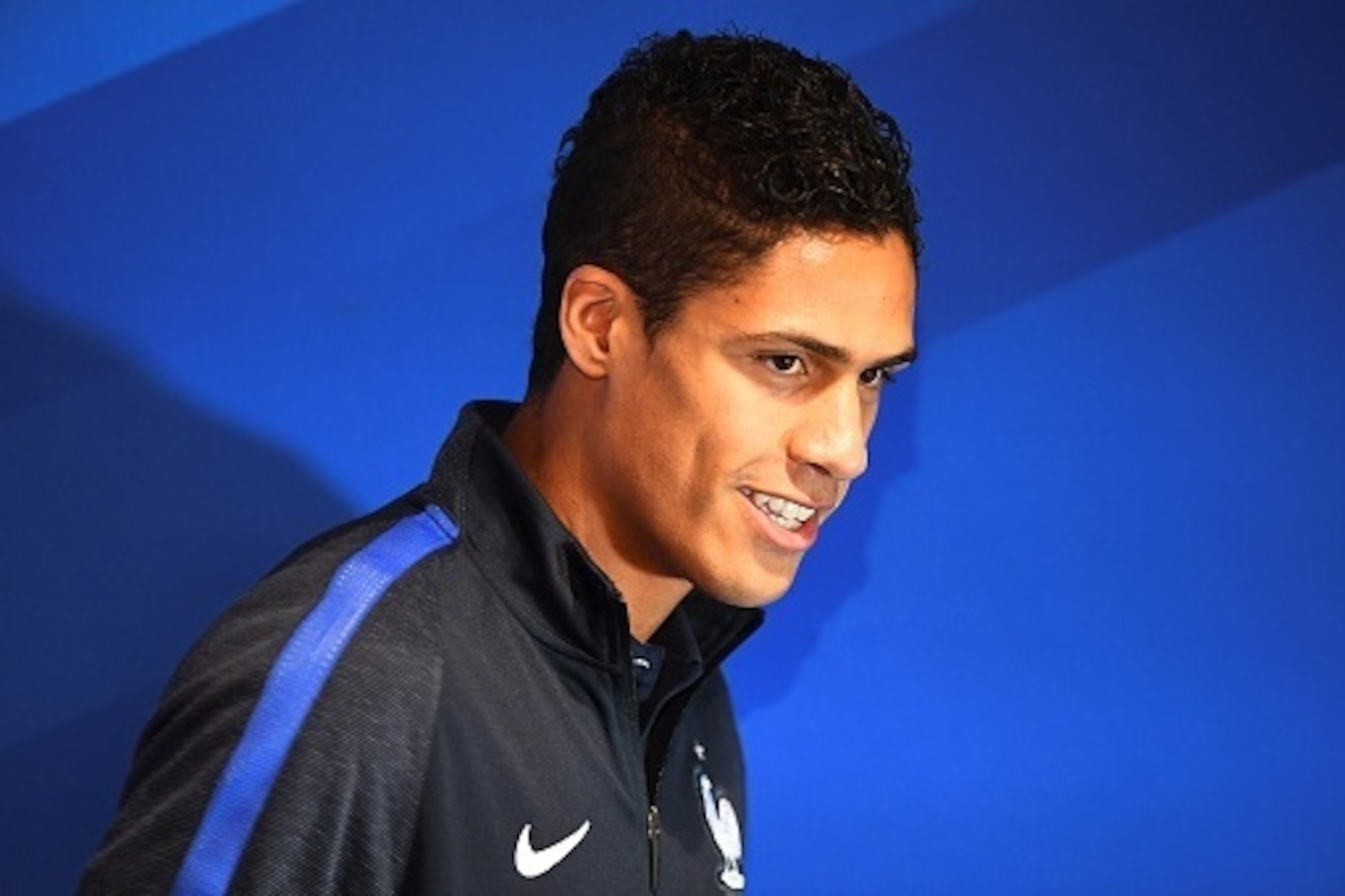 France's defender Raphael Varane leaves a press conference at the Bollaert stadium in Lens, on November 14, 2016, on the eve of the of the friendly football match against Ivory Coast.  / AFP / FRANCK FIFE        (Photo credit should read FRANCK FIFE/AFP/G