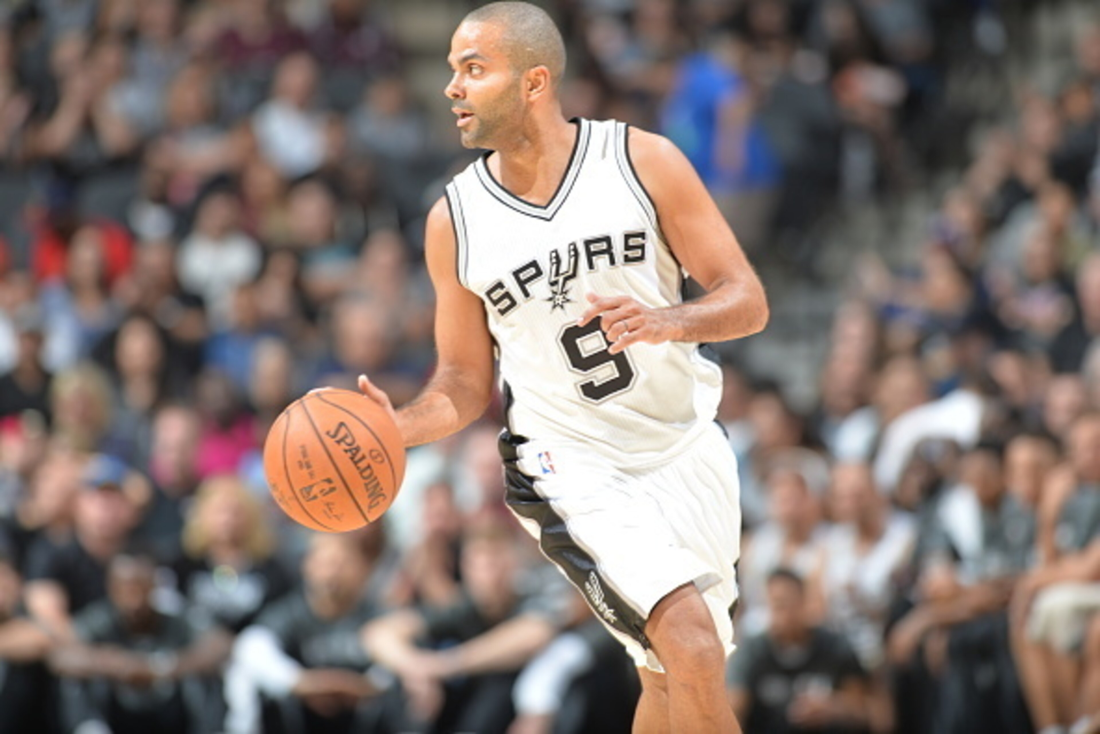 SAN ANTONIO, TX - OCTOBER 8: Dejounte Murray #5 of the San Antonio Spurs handles the ball against the Atlanta Hawks on October 8, 2016 at the AT&T Center in San Antonio, Texas. NOTE TO USER: User expressly acknowledges and agrees that, by downloading and SAN ANTONIO, TX - OCTOBER 8: Dejounte Murray #5 of the San Antonio Spurs handles the ball against the Atlanta Hawks on October 8, 2016 at the AT&T Center in San Antonio, Texas. NOTE TO USER: User expressly acknowledges and agrees that, by downloading and