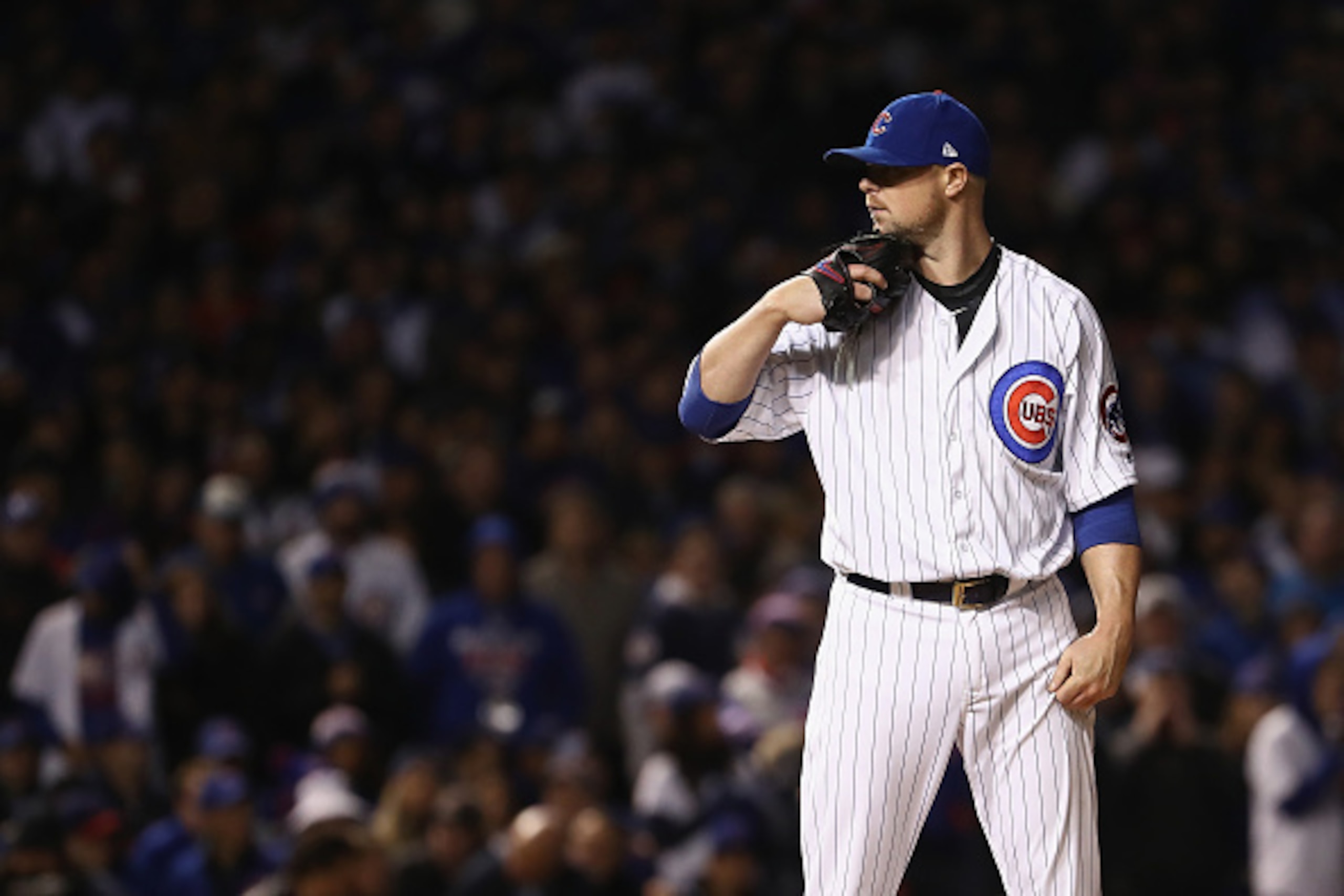 CHICAGO, IL - OCTOBER 30:  Jon Lester #34 of the Chicago Cubs pitches in the sixth inning against the Cleveland Indians in Game Five of the 2016 World Series at Wrigley Field on October 30, 2016 in Chicago, Illinois.  (Photo by Elsa/Getty Images)