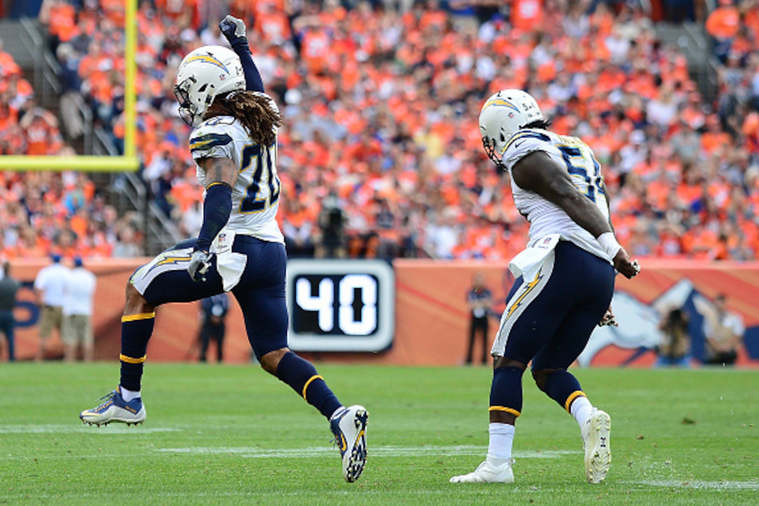 DENVER, CO - OCTOBER 30: Free safety Dwight Lowery #20 of the San Diego Chargers celebrates a sack in the redone in the second quarter of the game against the Denver Broncos at Sports Authority Field at Mile High on October 30, 2016 in Denver, Colorado. DENVER, CO - OCTOBER 30: Free safety Dwight Lowery #20 of the San Diego Chargers celebrates a sack in the redone in the second quarter of the game against the Denver Broncos at Sports Authority Field at Mile High on October 30, 2016 in Denver, Colorado.