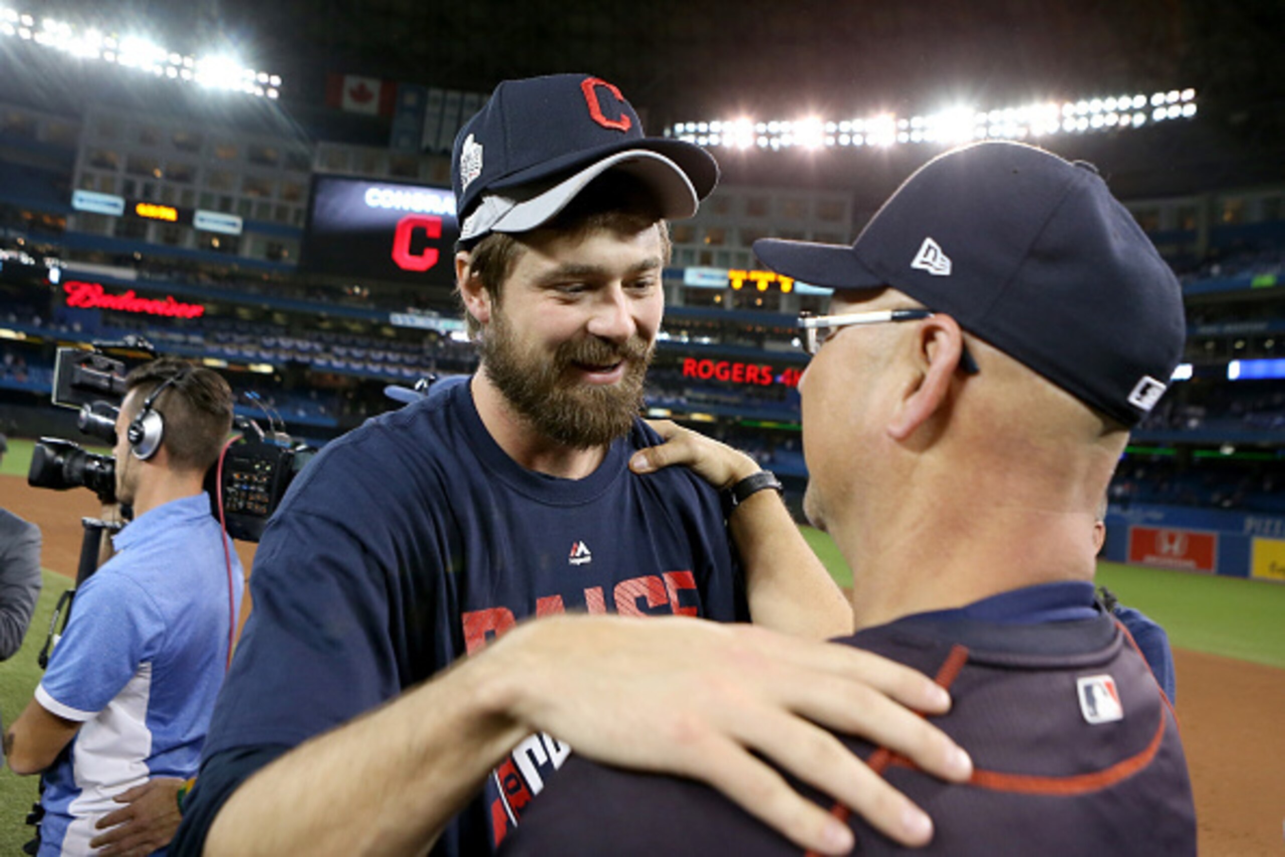 TORONTO, ON - OCTOBER 19: Andrew Miller #24 and Manager Terry Francona #17 of the Cleveland Indians celebrate after defeating the Toronto Blue Jays with a score of 3 to 0 in game five to the American League Championship Series at Rogers Centre on October TORONTO, ON - OCTOBER 19: Andrew Miller #24 and Manager Terry Francona #17 of the Cleveland Indians celebrate after defeating the Toronto Blue Jays with a score of 3 to 0 in game five to the American League Championship Series at Rogers Centre on October