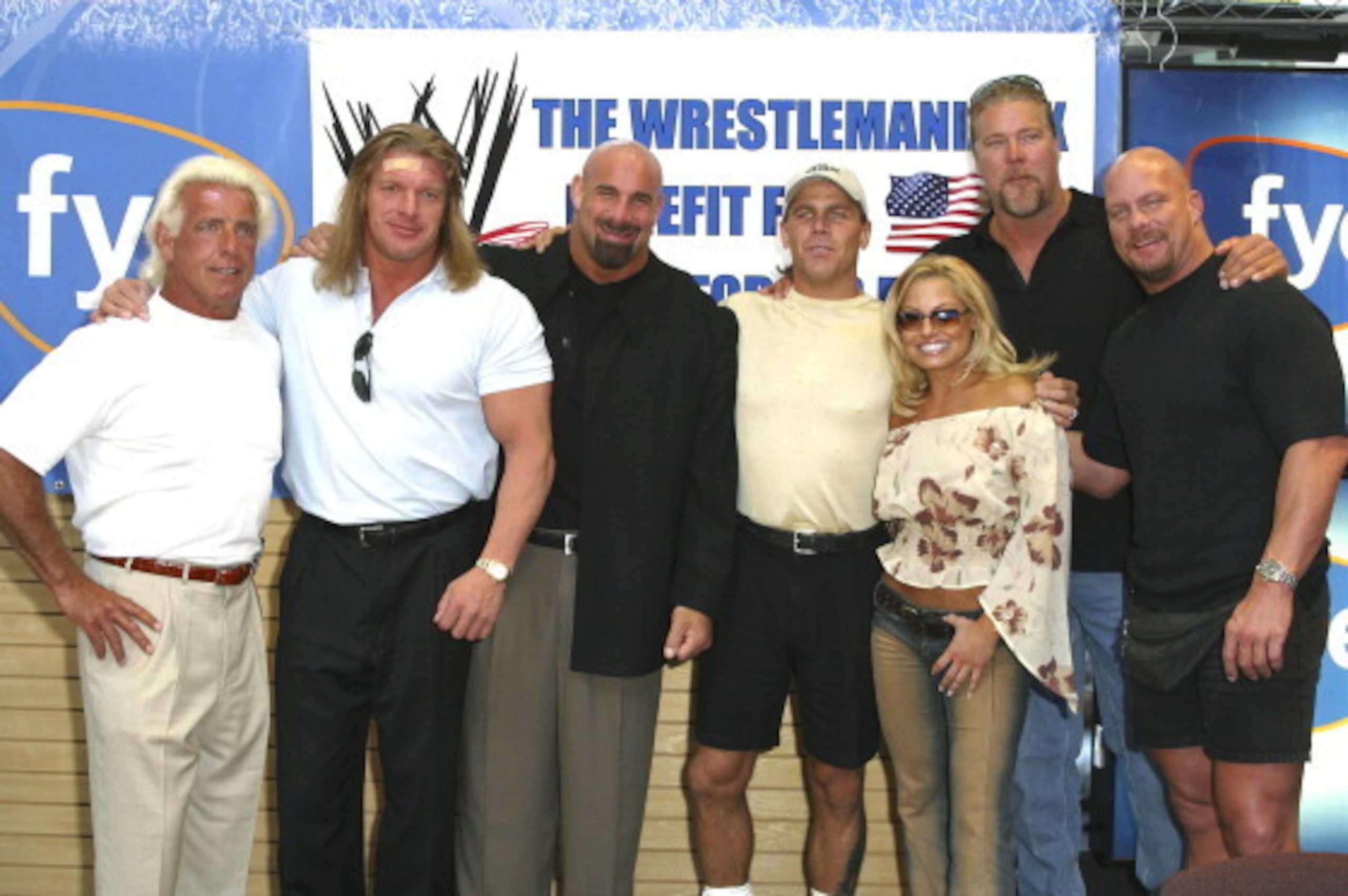 Ric Flair, Triple H, Bill Goldberg, Shawn Michaels, Trish Stratus, Kevin Nash and Stone Cold Steve Austin (Photo by Mychal Watts/WireImage)