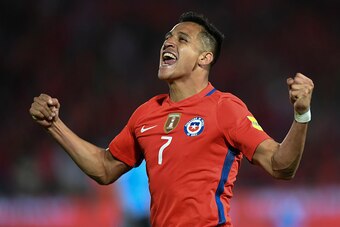 Chile's Alexis Sanchez celebrates after scoring against Uruguay during their 2018 FIFA World Cup qualifier football match in Santiago, on November 15, 2016. / AFP / Martin BERNETTI        (Photo credit should read MARTIN BERNETTI/AFP/Getty Images)