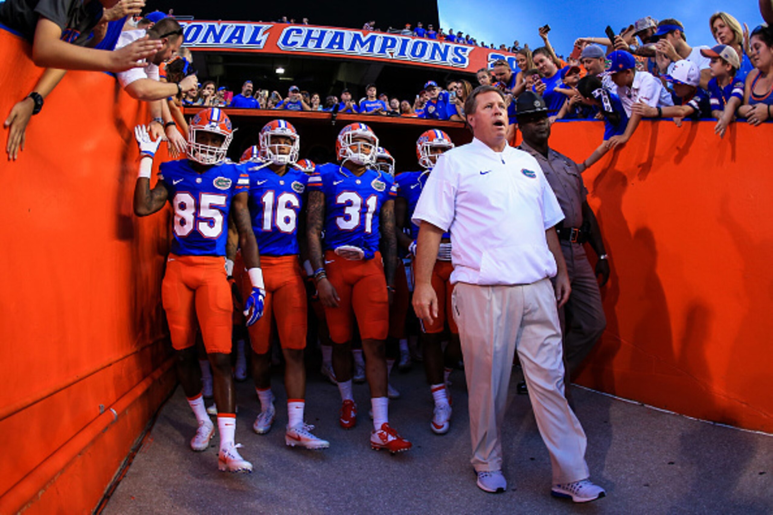GAINESVILLE, FL - SEPTEMBER 17: Head coach Jim McElwain leads the Florida Gators onto the field before the game against the North Texas Mean Green at Ben Hill Griffin Stadium on September 17, 2016 in Gainesville, Florida. (Photo by Rob Foldy/Getty Images) GAINESVILLE, FL - SEPTEMBER 17: Head coach Jim McElwain leads the Florida Gators onto the field before the game against the North Texas Mean Green at Ben Hill Griffin Stadium on September 17, 2016 in Gainesville, Florida. (Photo by Rob Foldy/Getty Images)